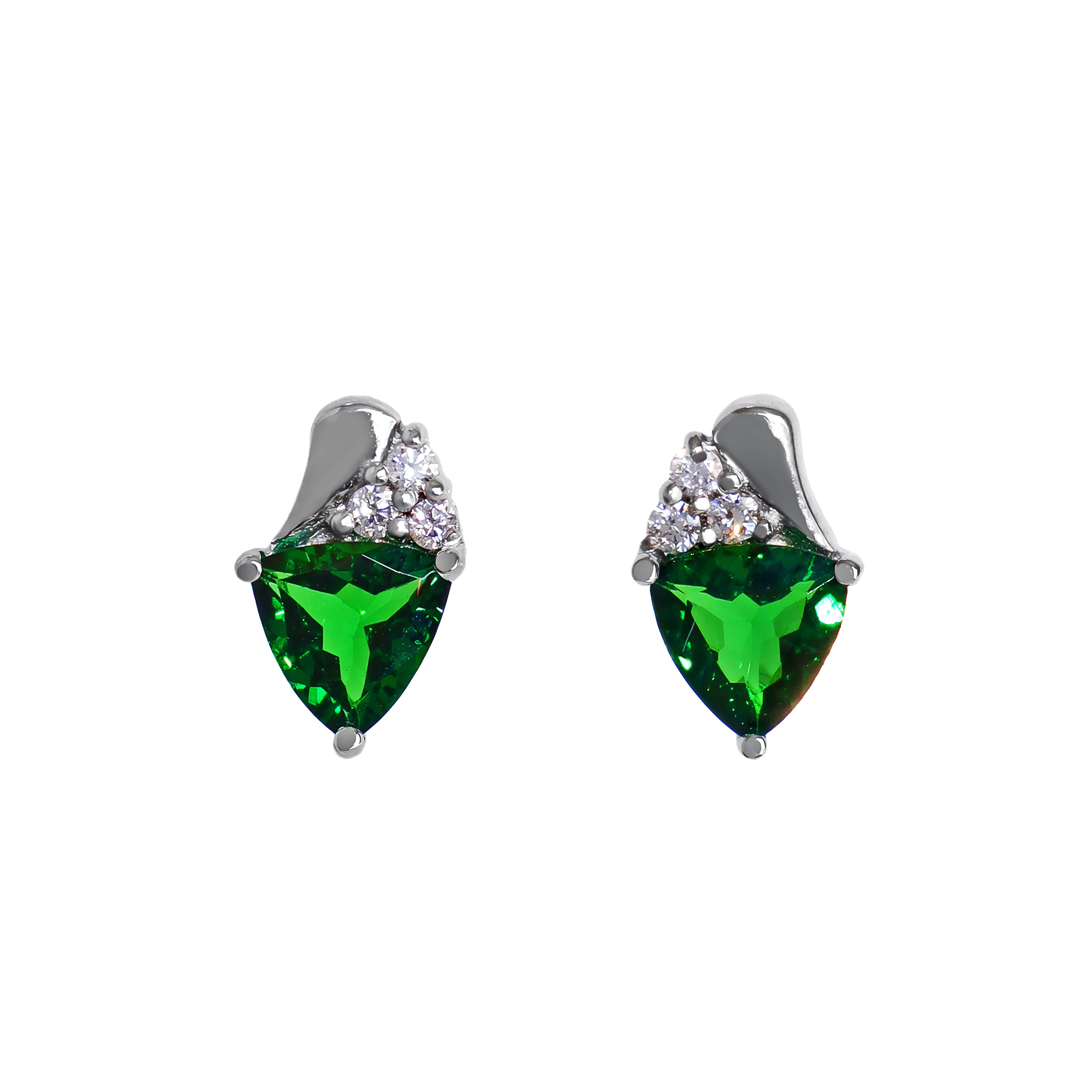A product photo of a pair of white gold tsavorite earrings sitting against a white background. The trilliant-shaped gemstones are complimented by a trio of white diamonds atop each stone, hugged by a teardrop-shaped frame of white gold. The green gemstone colours make these earrings a good alternative or substitute for emerald.