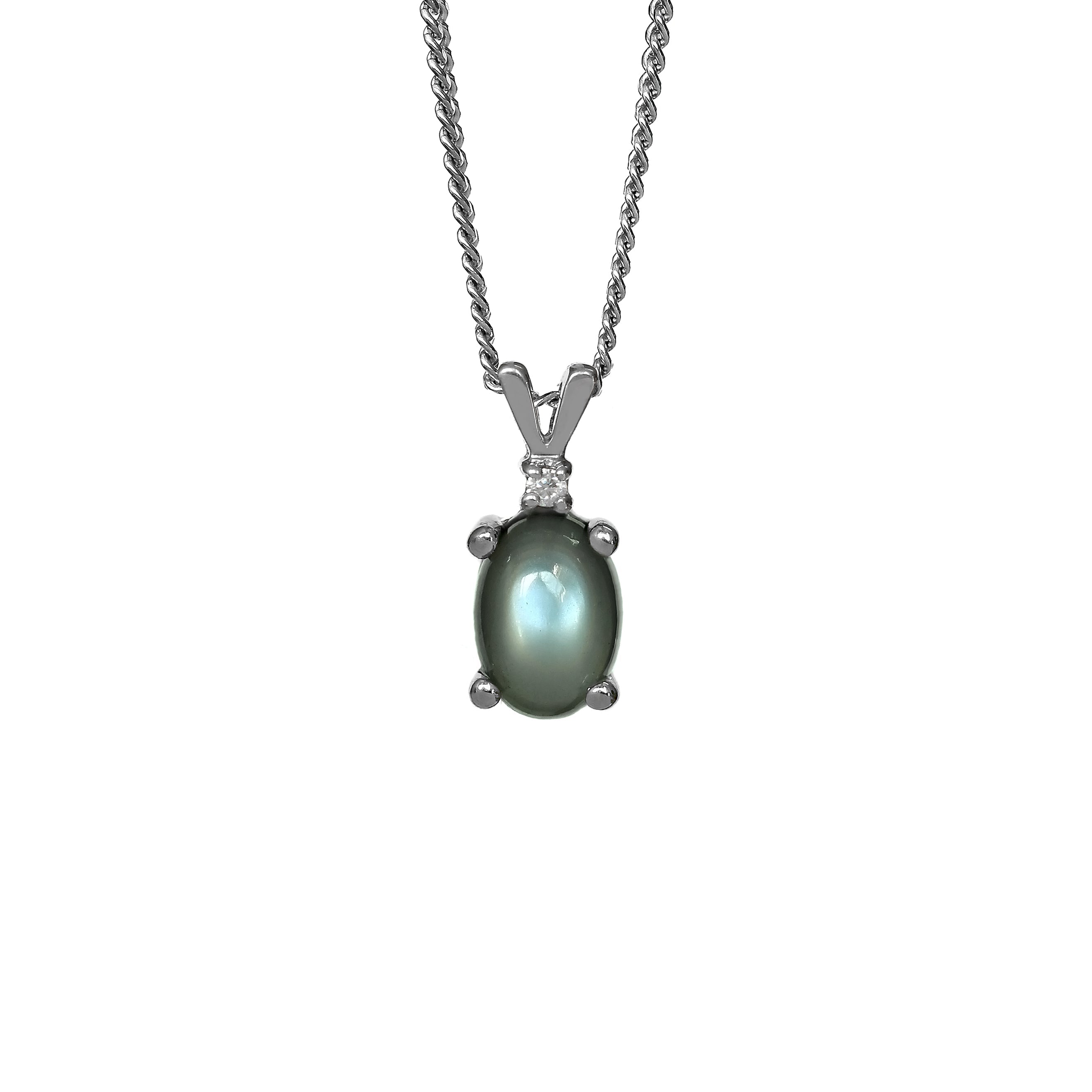 A product photo of a grey moonstone pendant set in solid sterling 925 silver suspended by a silver chain over a white background. The grey, opalescent moonstone shimmers, and is topped a single white moissanite.