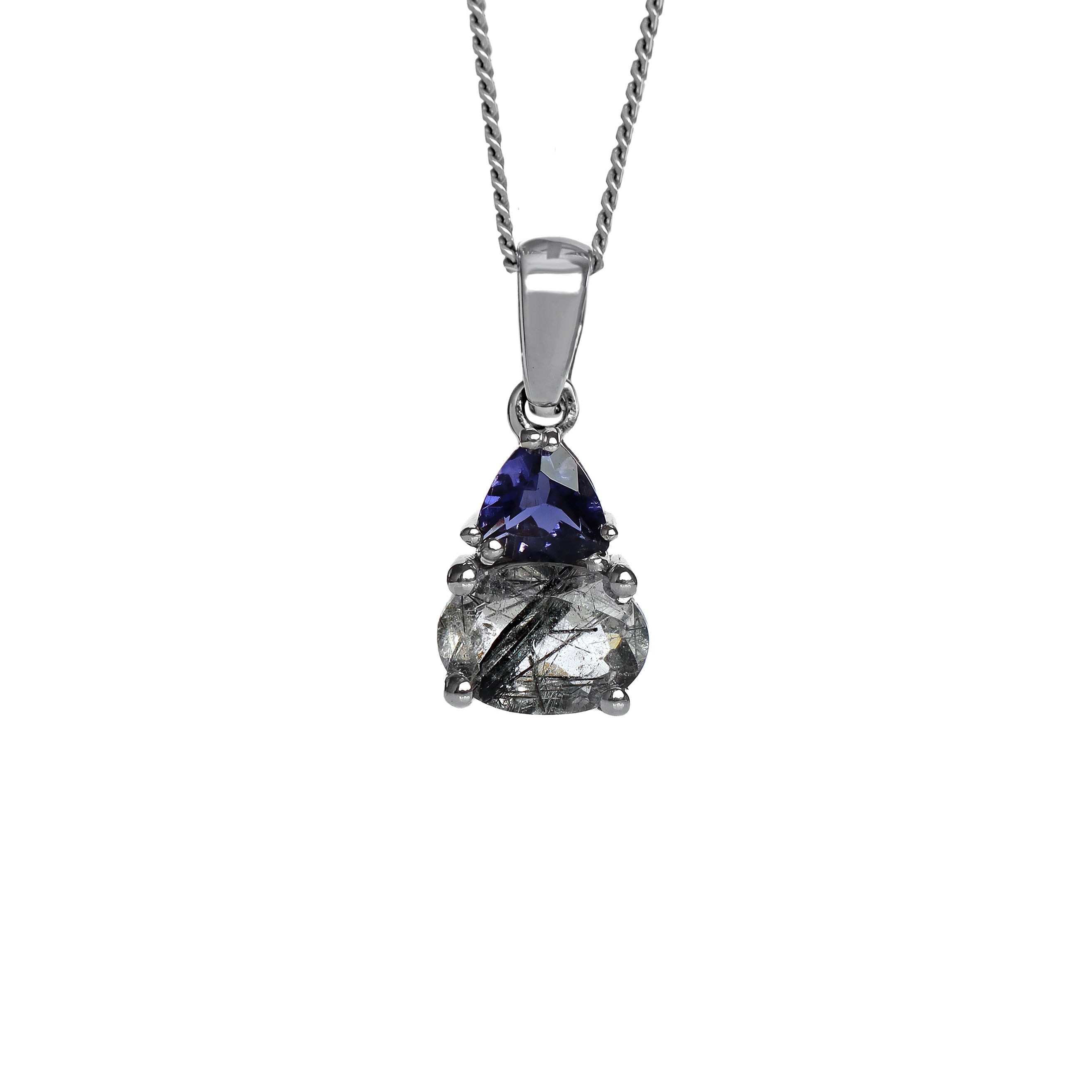 A product photo of a silver black rutiliated quartz and iolite necklace suspended against a white background. The horizontally-oriented black rutiliated quartz stone is held in place by 4 pairs of claws at its top and bottom, with a 5mm iolite gem connecting the stone to the rest of the pendant. It is suspended by a simple silver chain.
