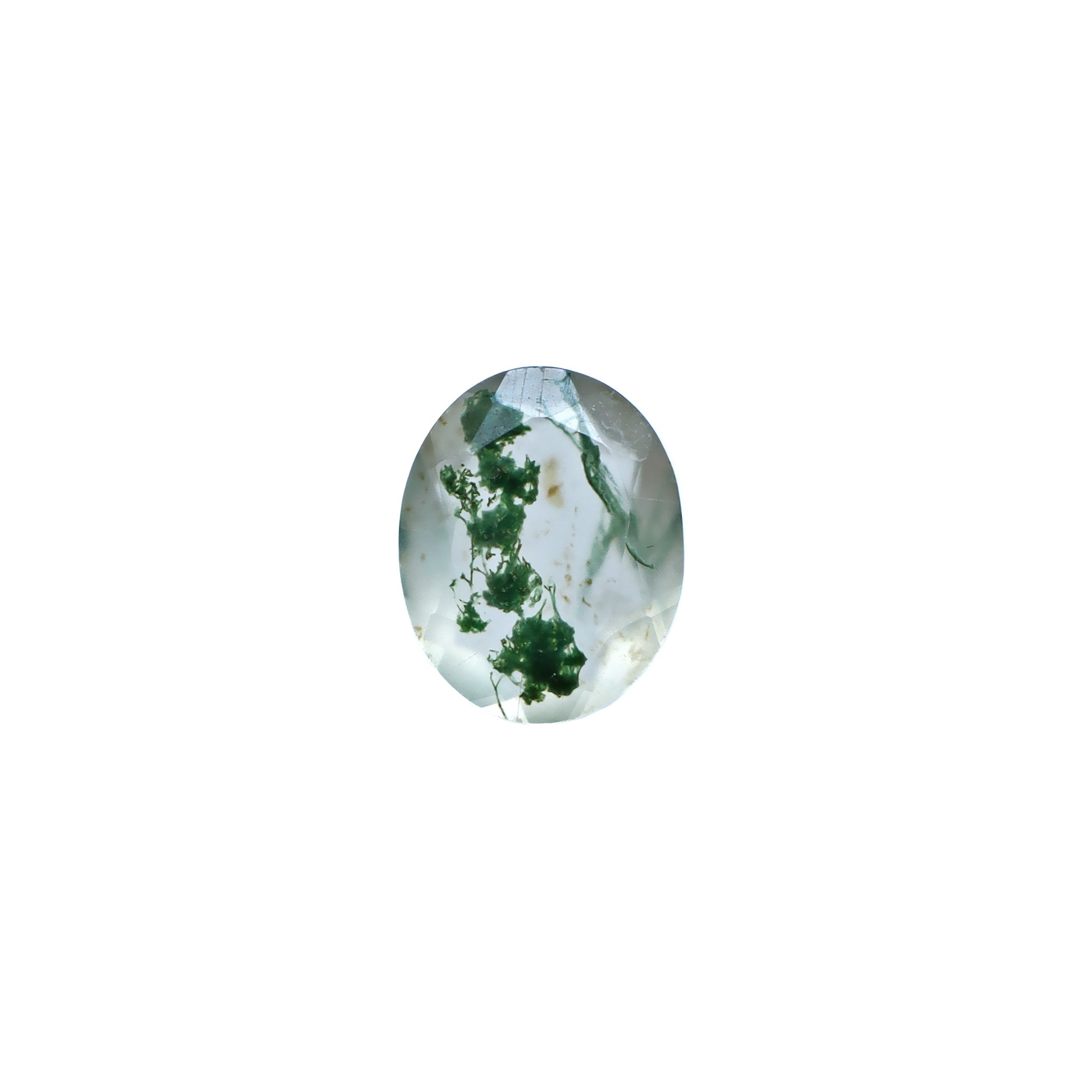 An exquisite 10x8mm Faceted Oval Moss Agate loose gemstone on a plain white background, showcasing intricate deep forest green "moss-like" dendritic inclusions, beautifully suspended within a clear, faceted crystal base. This unique natural green moss agate is ideal for custom engagement rings, bespoke pendants, or as a striking focal point in fine jewellery designs, perfect for nature lovers.