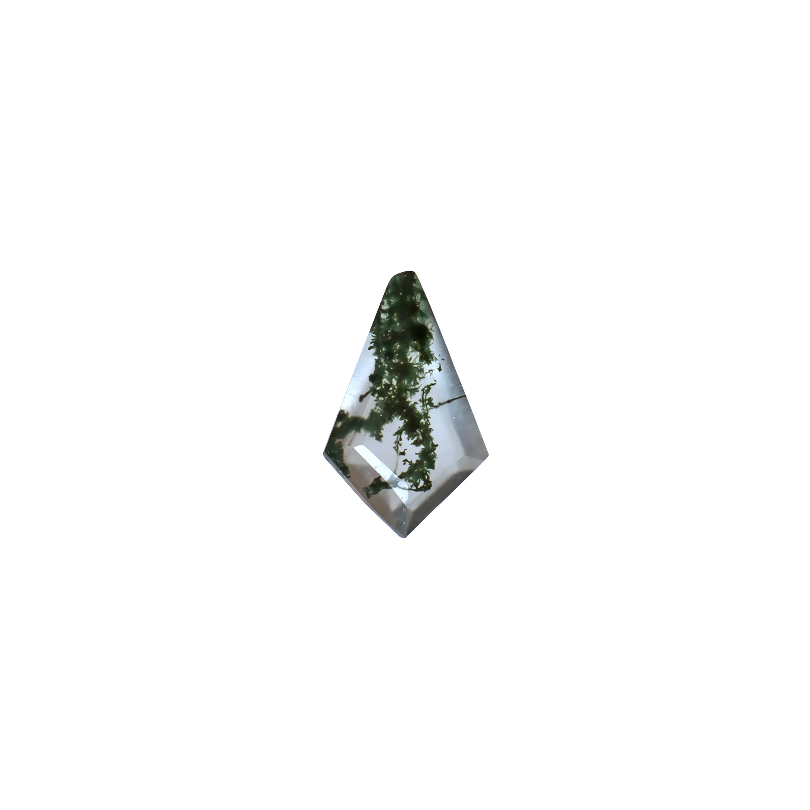 A unique 10x6mm Faceted Kite-Shaped Moss Agate on a white background. An exquisite natural loose gemstone featuring vibrant, forest green moss-like dendritic inclusions. Ideal for contemporary designs, perfect for Art Deco revival designs, geometric jewellery, side stones, or as a focal point in custom engagement rings. Perfect for lovers of nature and shoppers with alternative taste. A highly popular shape, preferred by bespoke engagement clients.
