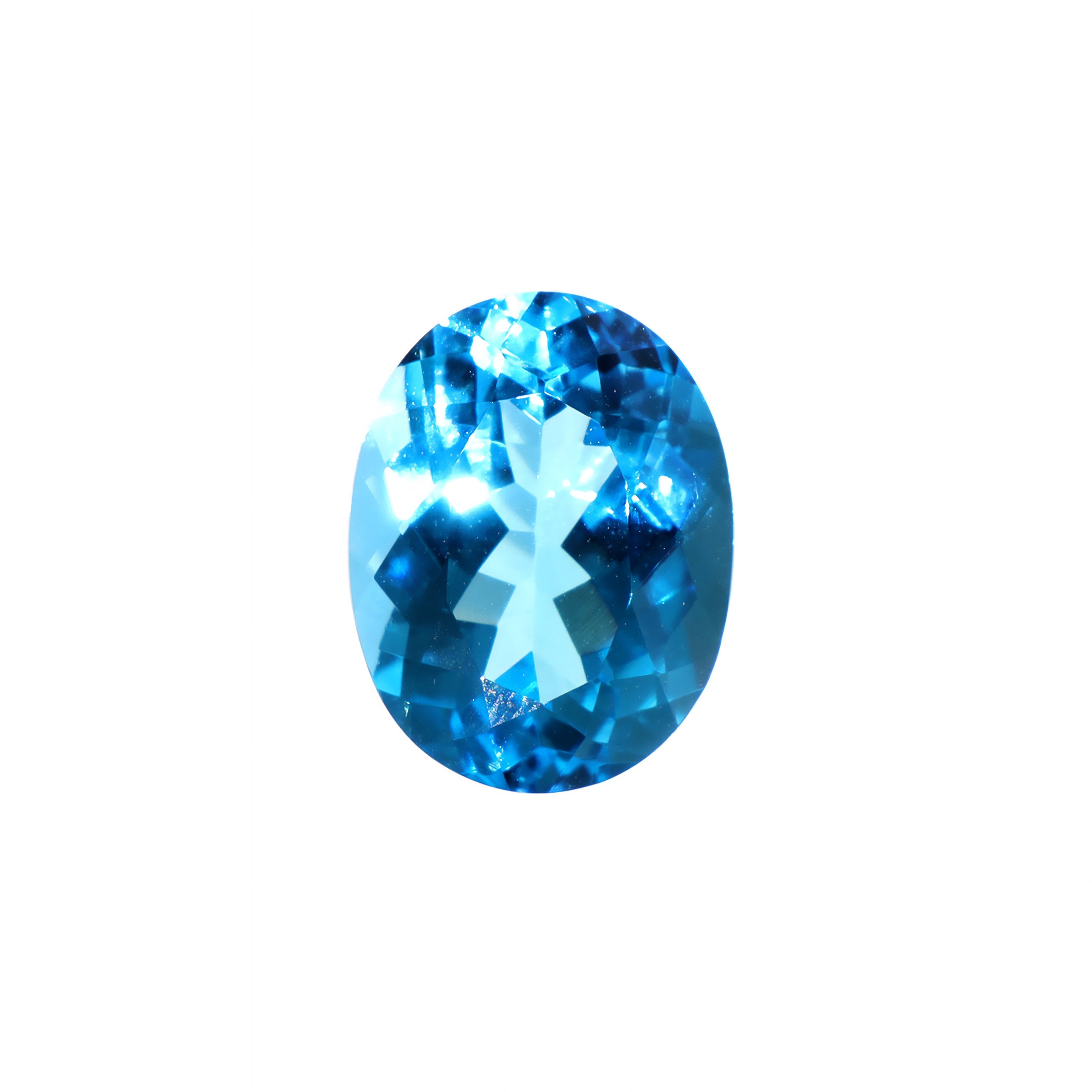 A stunning 13x10mm Oval cut Swiss blue topaz gemstone on a white background, featuring a rich, natural saturated blue hue. This beautifully-faceted blue topaz oval, also known as the November birthstone, is ideal for bespoke jewellery design, or as a gift to those with a November birthday.