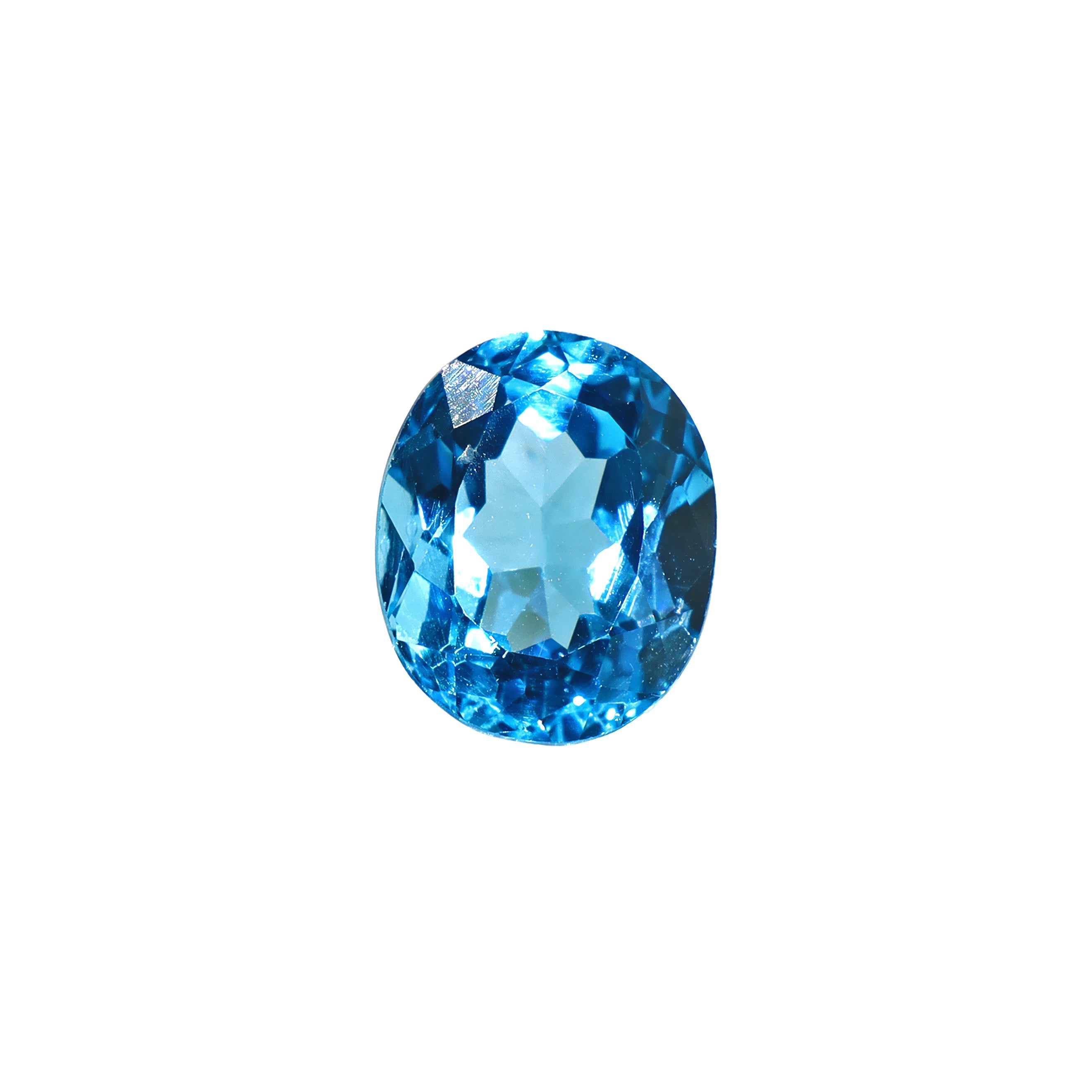 A stunning 11x9mm Oval cut Swiss blue topaz gemstone on a white background, featuring a rich, natural saturated blue hue. This beautifully-faceted blue topaz oval, also known as the November birthstone, is ideal for bespoke jewellery design, or as a gift to those with a November birthday.