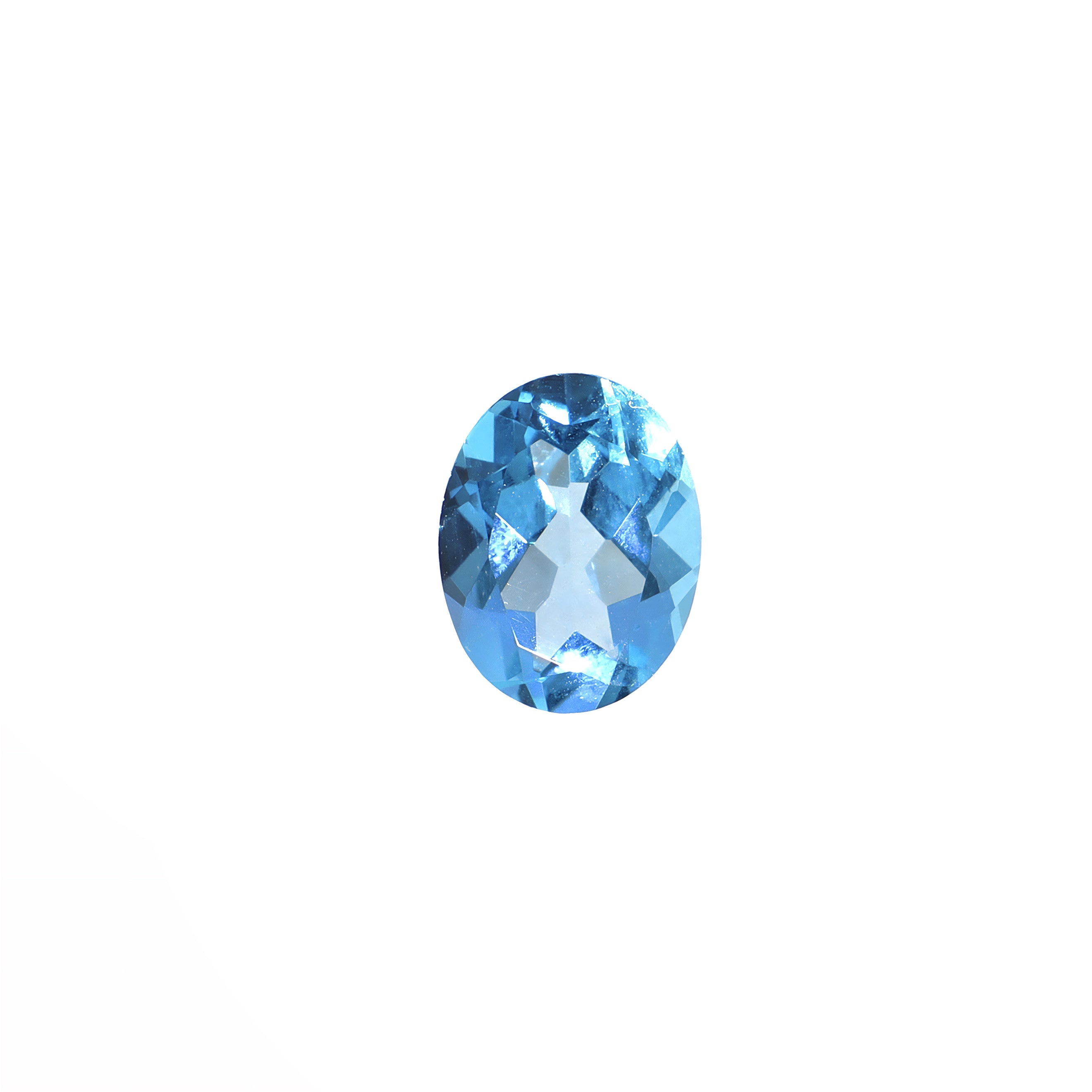 A stunning 9x7mm Oval cut Swiss blue topaz gemstone on a white background, featuring a rich, natural saturated blue hue. This beautifully-faceted blue topaz oval, also known as the November birthstone, is ideal for bespoke jewellery design, or as a gift to those with a November birthday.