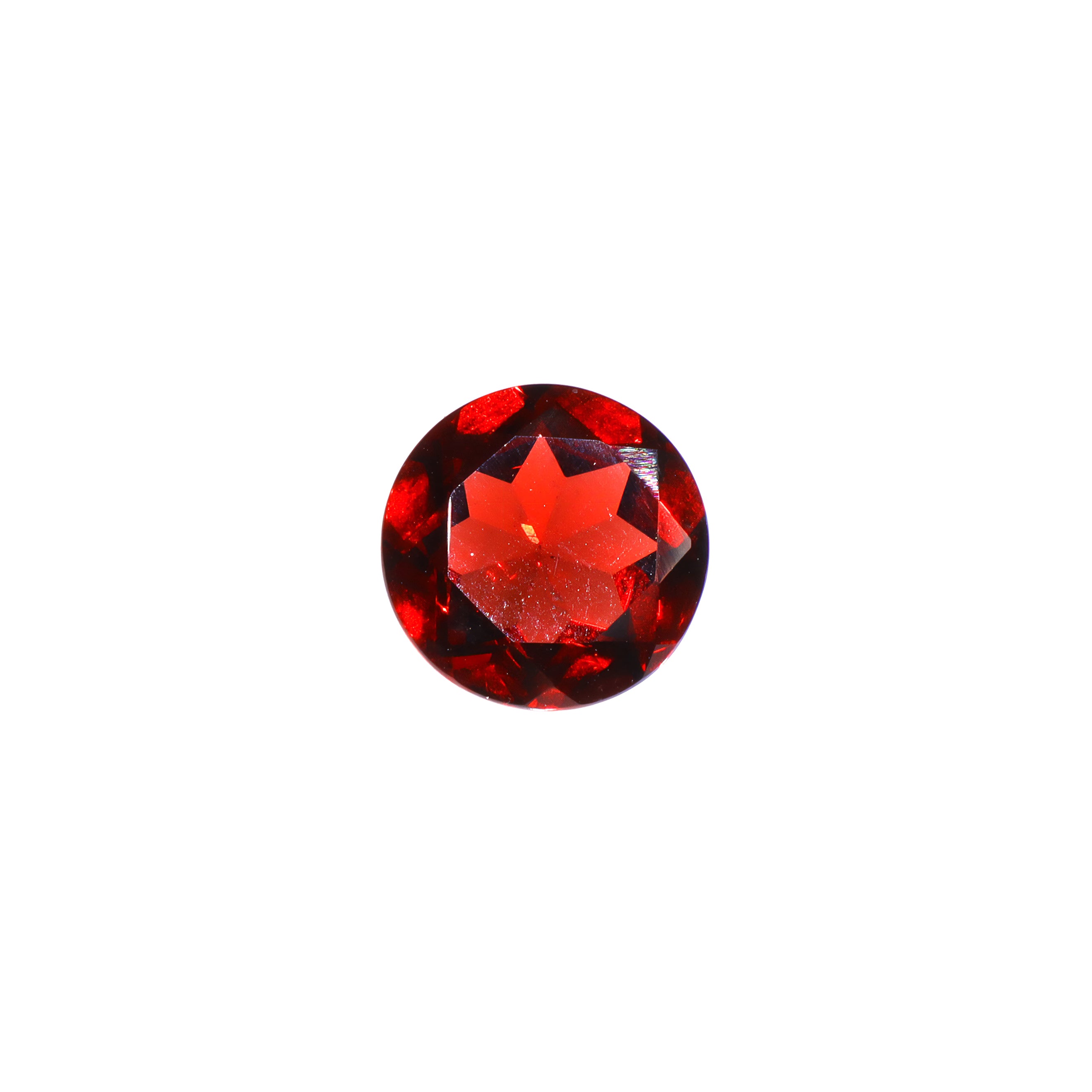 A loose 9mm round cut red Mozambican garnet gemstone on a white background. This brilliant, richly coloured garnet, January's birthstone, is perfect for creating custom fine jewellery: including engagement rings, cocktail rings, or a striking birthstone pendant for a loved one born in January. The colouring is a deep, rich scarlet red. The size is large, but small enough for use in everyday wearable jewellery - and is not limited to statement designs.