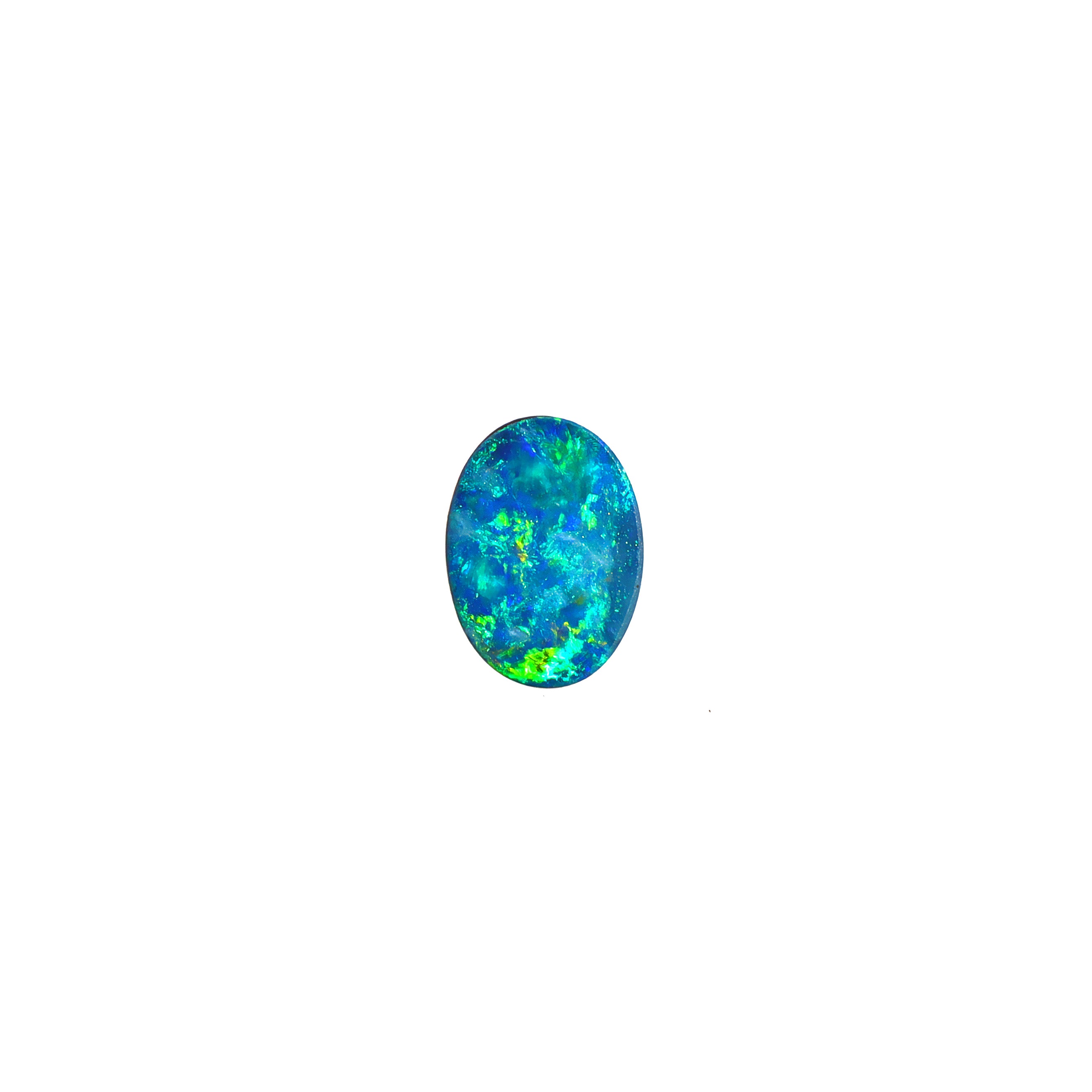 A product photo featuring a 7x5mm oval opal doublet on a white background. The stone shows a brilliant play-of-colour with distinct flashes of green and blue. Ideally suited for a delicate bespoke ring, a necklace charm or a dainty custom pendant. A beautiful and affordable October birthstone choice for elegant jewellery.
