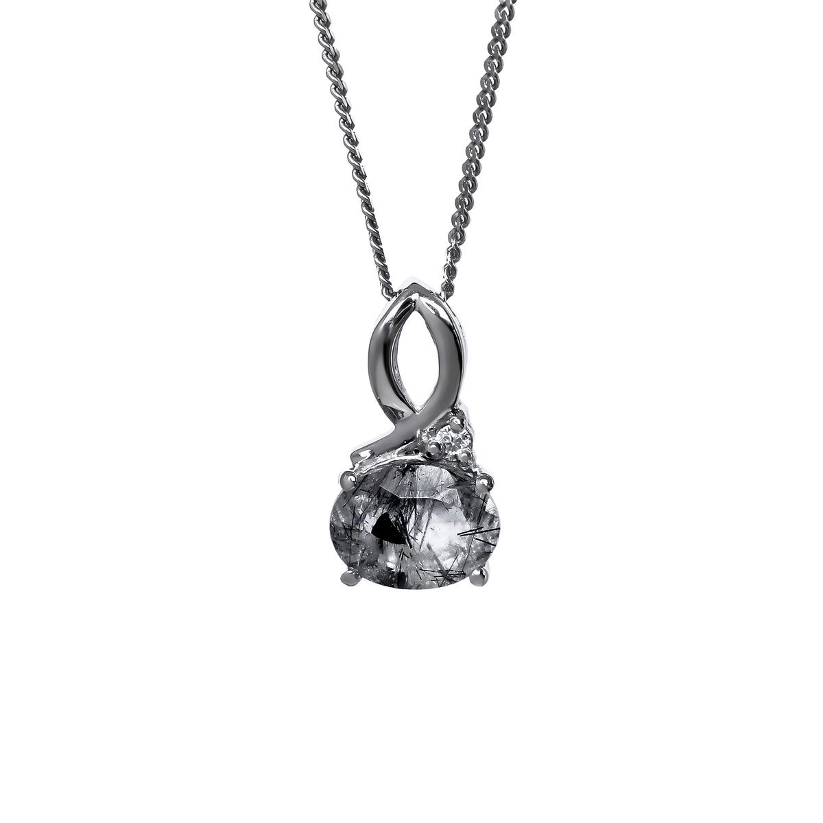 A product photo of a silver tourmalated quartz and moissanite necklace suspended against a white background. The tourmalated quartz is horizontally-oriented and held in place by 4 silver claws, connecting the gemstone to its unique bail, consisting of looping silver detailing and a single tiny moissanite detail where one loop intersects.