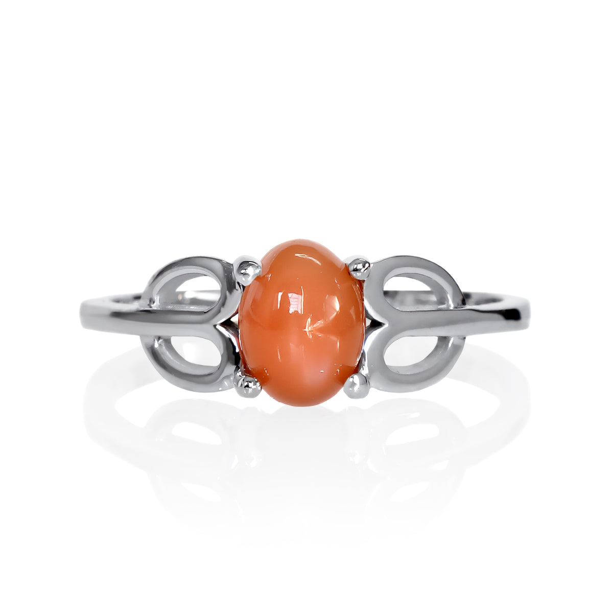 A product photo of a silver orange moonstone ring on a white background. The ring consists of a single 7x5mm cabochon-cut moonstone stone hugged between two looping silver "petals" on either side, which transition into a smooth flat band in the middle.