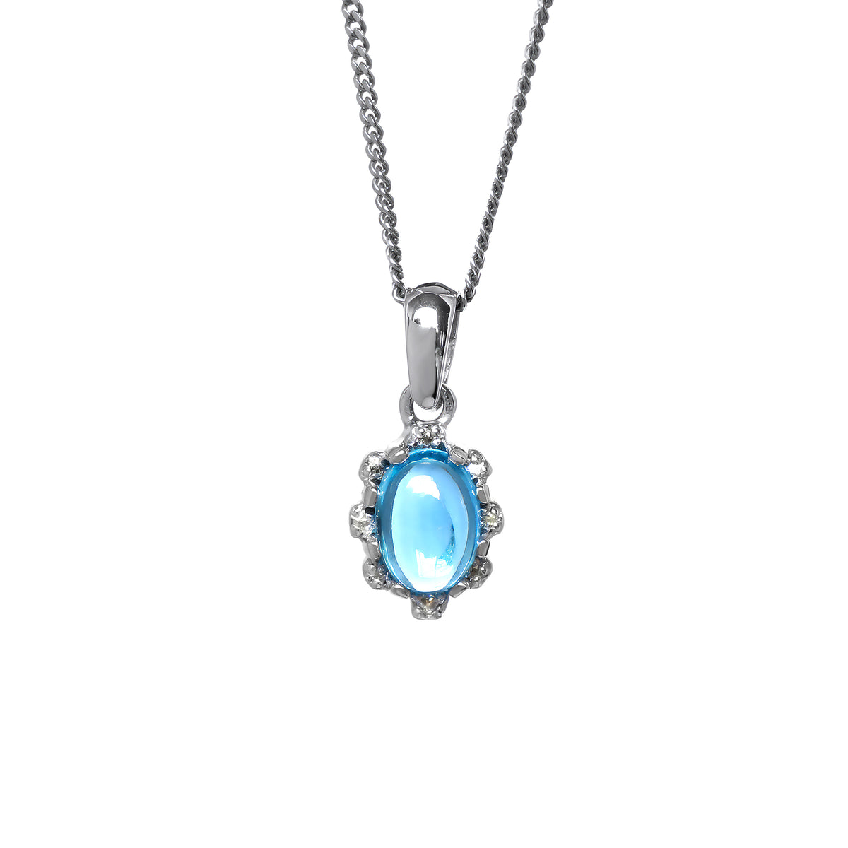 A product photo from showing a silver blue topaz pendant on a fine twist chain against a white background. The blue topaz is secured by four discreet claws and surrounded by a scalloped, floral-inspired halo set with small, glittering white accent stones. The pendant hangs from a polished, classic tapered silver bail.