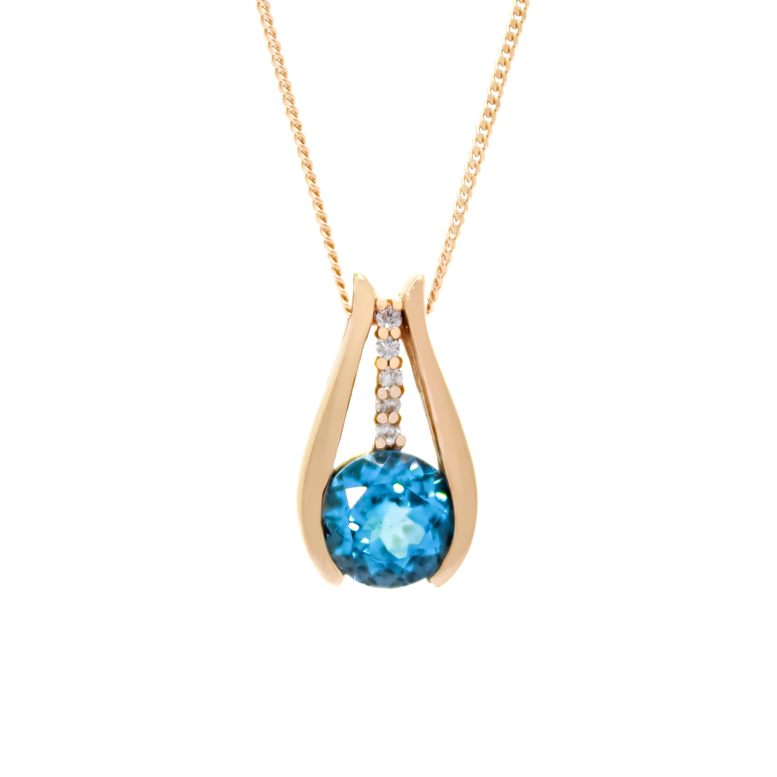 A product photo of a solid 9ct rose gold necklace with diamond and blue topaz detailing. The pendant is made up of 4 different elements, two smooth rose gold bands framing the exterior, a round blue topaz stone starring at the bottom of the interior, and an interior rose gold strip of 4 tiny diamonds connecting the blue topaz stone to the bail.