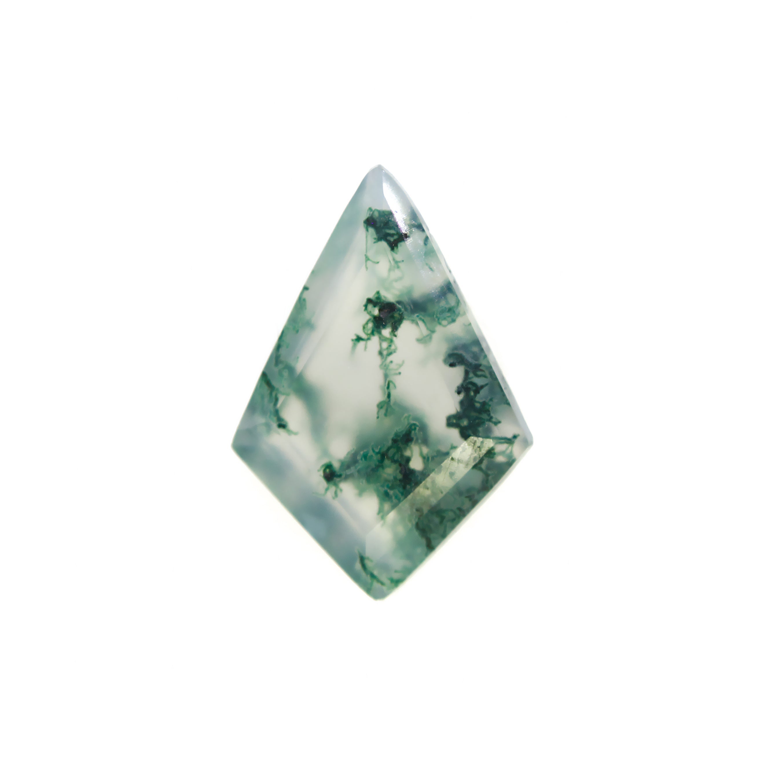 A product image of a loose 14x10mm faceted moss agate stone in the classic kite-shaped gemstone cut. The stone has a cool white milky colour, with deep, swirling green natural inclusions - appearing as moss-like structures or delicate inkspills within the stone. The faceted edges reflect bright white light.