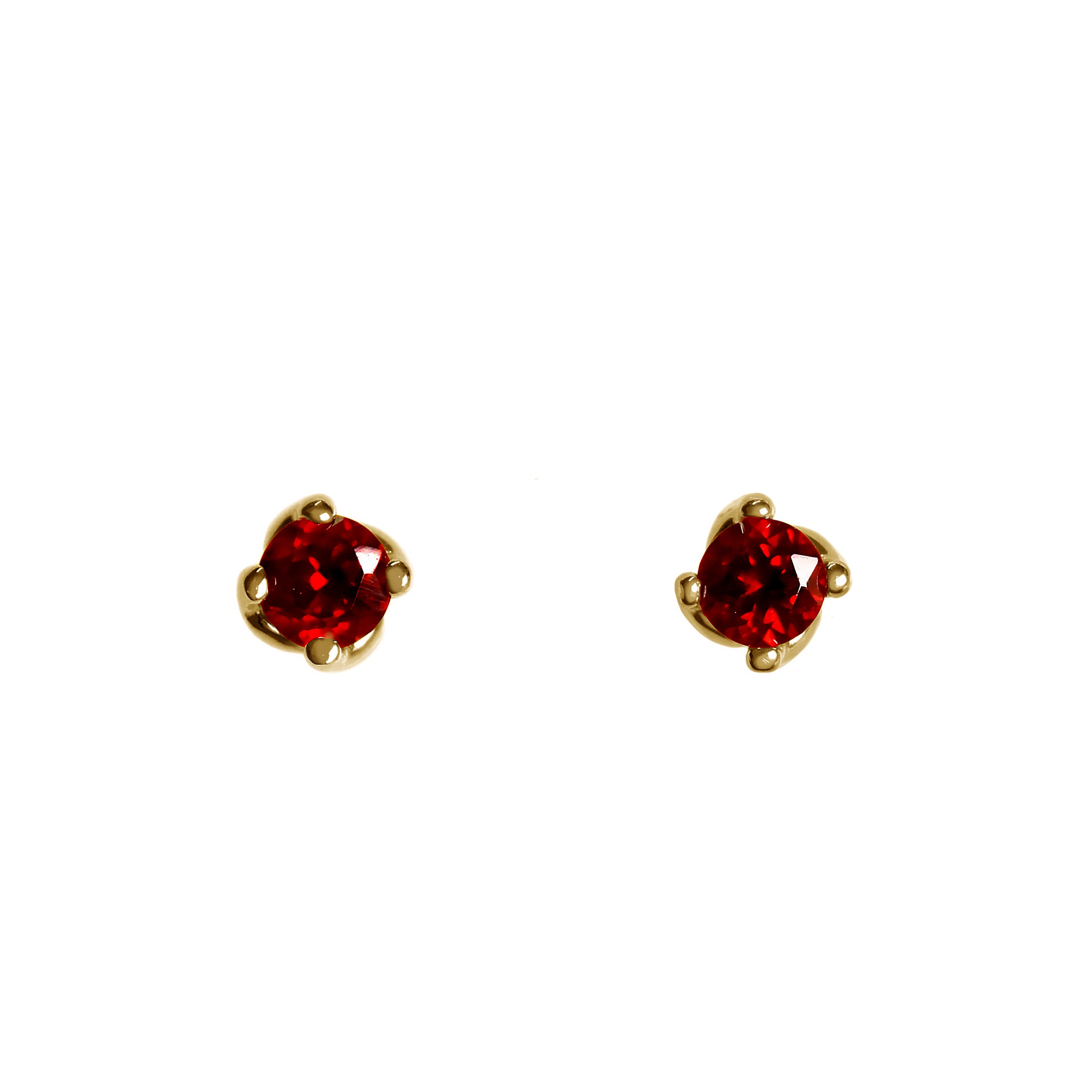 A product photo of 3.5mm Round Garnet Earring Studs in 9k Yellow Gold sitting on a plain white background. The stones are held in place by 4 delicate golden claws arranged in a flower-like pattern where they meet the stud. The garnets reflect sanguine hues across their multi-faceted edges.