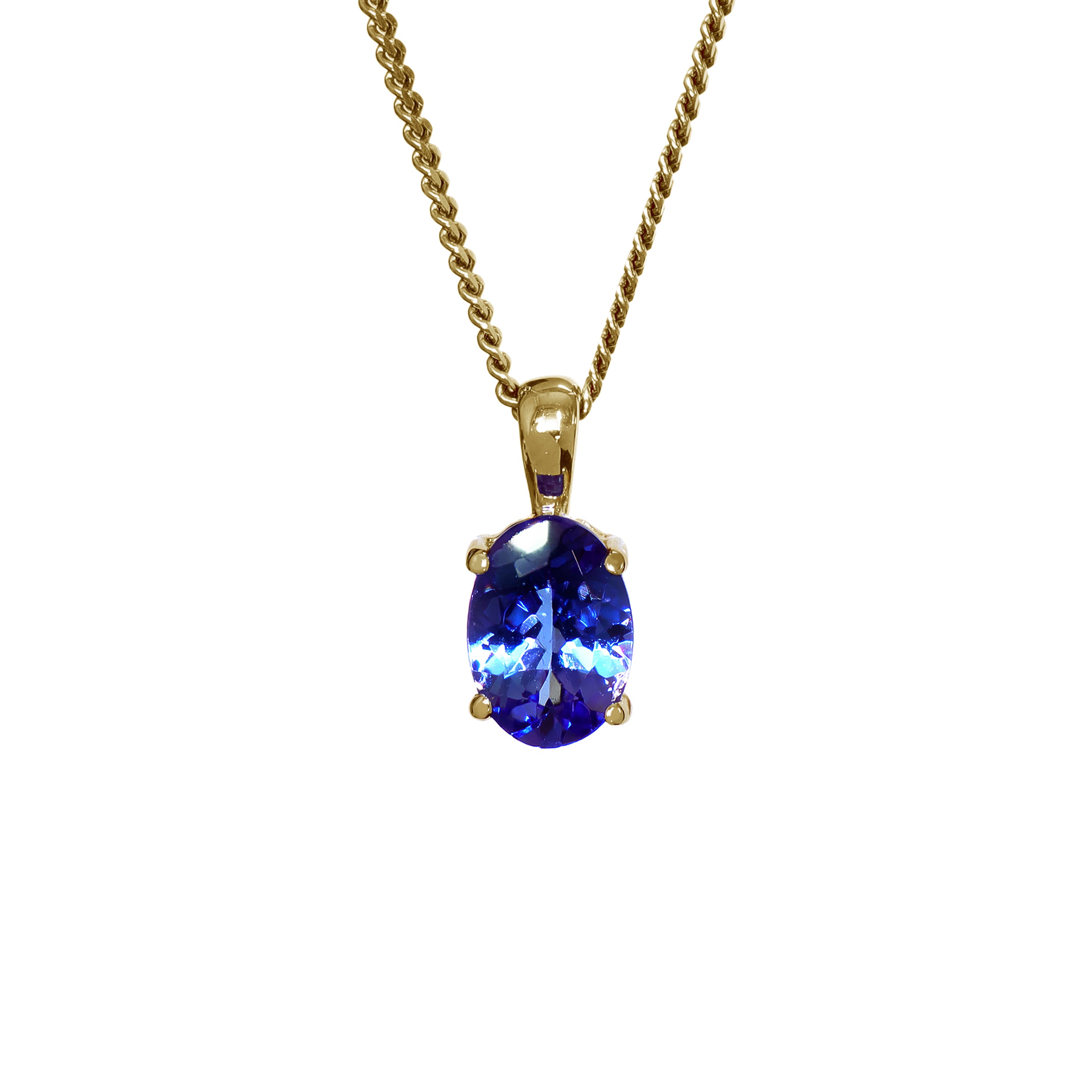A product photo of a yellow gold tanzanite pendant suspended by a chain against a white background. The oval stone is held in place by 4 small claws, and reflects violet blue and indigo colours from its many edges.