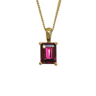 A product photo of a 8x6mm Rectangular Rhodalite Pendant in 9k Yellow Gold suspended against a white background. The impressively large and deeply-coloured stone is contrasted by its overall minimalistic design, 4 simple golden claws holding the gem in place. It is suspended by a simple gold chain. The rhodalite reflects warm, pinky purple hues across its multi-faceted edges.