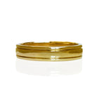 A product photo of a mens' ring made of 9k yellow gold. The band is 5mm tall and detailed with two polished grooves running along its length.
