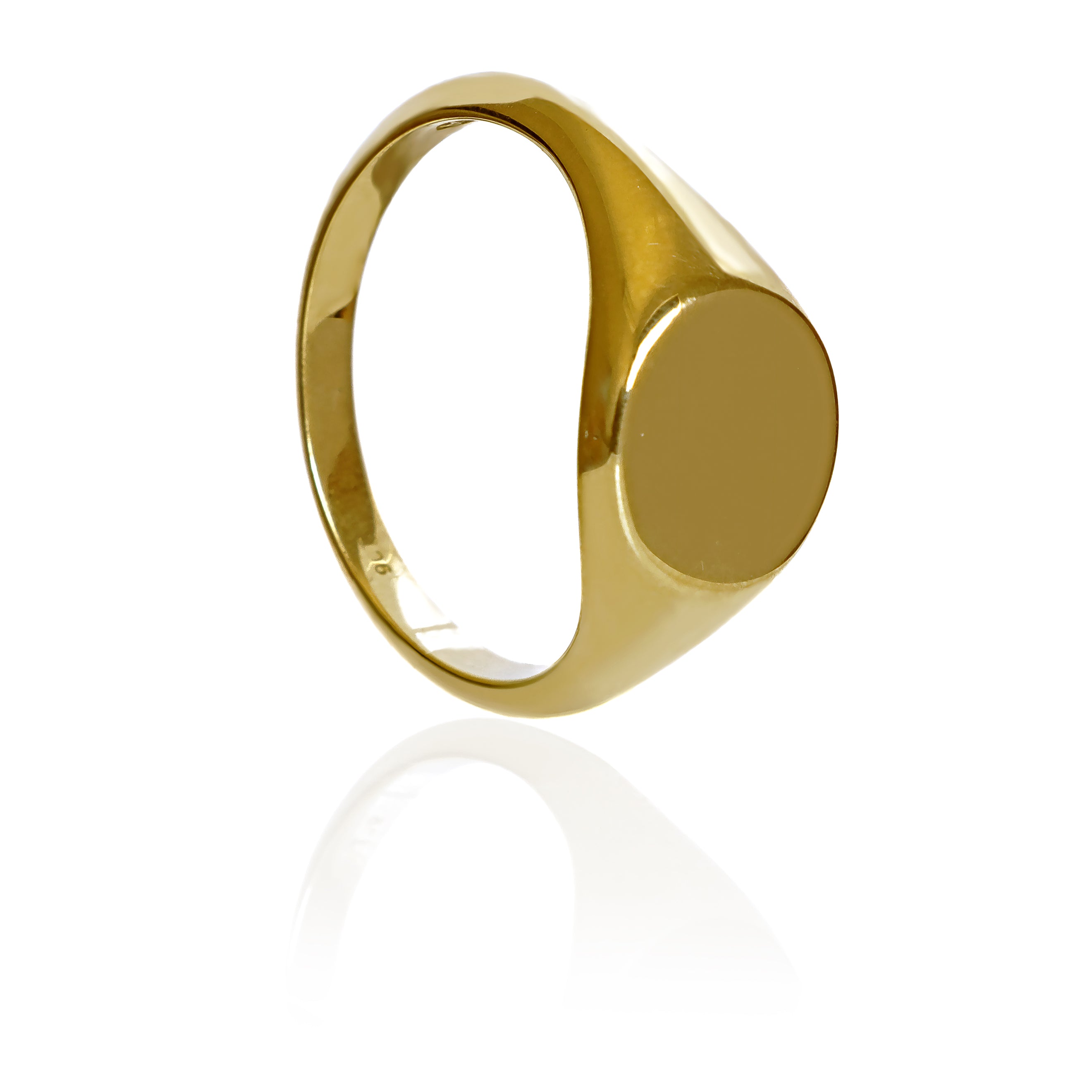 A product photo of a mens' signet ring made of 9k yellow gold. The face of the ring is a 10mm round flat circle that transitions to a thick rounded band.