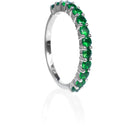 A product photo of a white gold eternity band with 13 tsavorite stones embedded along its length on a white background. The green gemstone colour would be a good emerald substitute.