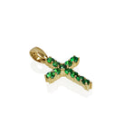 A product photo of a dainty cross pendant delicately bejewelled with electric green tsavorite stones suspended against a white background. The Christian cross pendant is made up of 11 stones in total, which reflect verdant hues from their facets. Perfect for use as a girl's confirmation necklace.