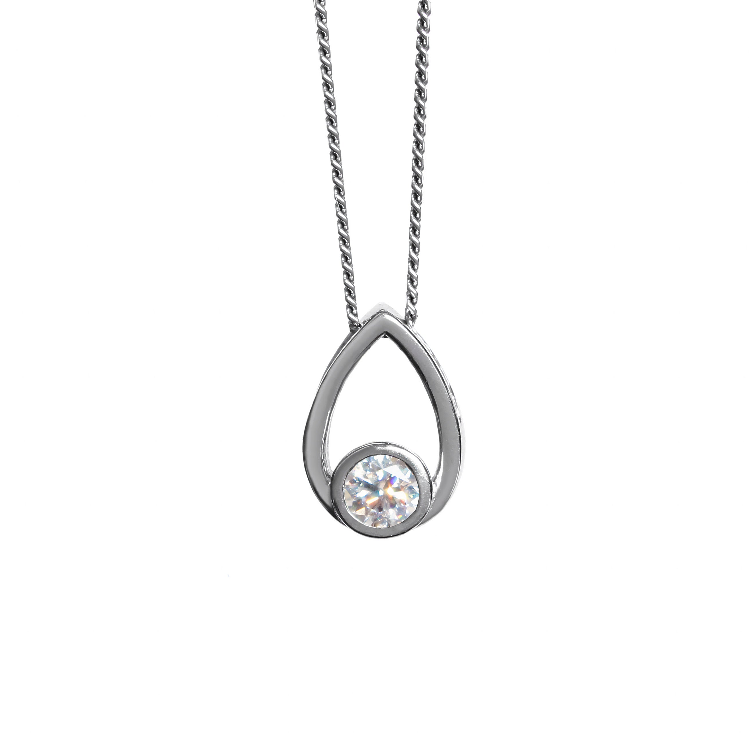 A product photo of a moissanite pendant in solid 925 sterling silver suspended by a silver chain on a clear white background. The pendant is in the shape of a small teardrop, with a petite silver-encased circle-cut moissanite gem nestled at its base. The silver teardrop shape is smooth and unblemished.