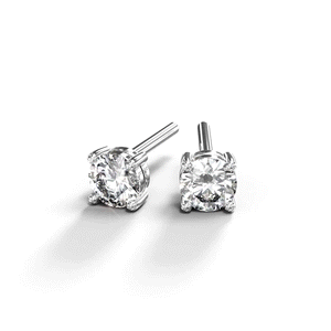 A turntable video of a pair of 9 karat white gold lab diamond stud earrings sitting in the sun on a white textured background. The brilliant, colourless half pointer round diamonds measure approximately 3.5mm across, and are held in place by a simple 4-claw setting.