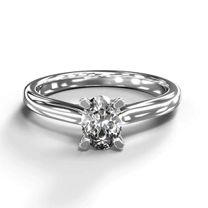 A turntable video of a 14 karat white gold lab diamond solitaire engagement ring sitting in the sun on a white textured background. The brilliant, colourless half pointer oval-cut diamond measures 4.5mm across, and is held in place by 4 delicate claws in a high-profile trellis setting.