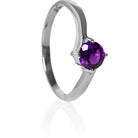 A product photo of a curved-band silver solitaire ring with a deep purple amethyst centre stone sitting on a white background.