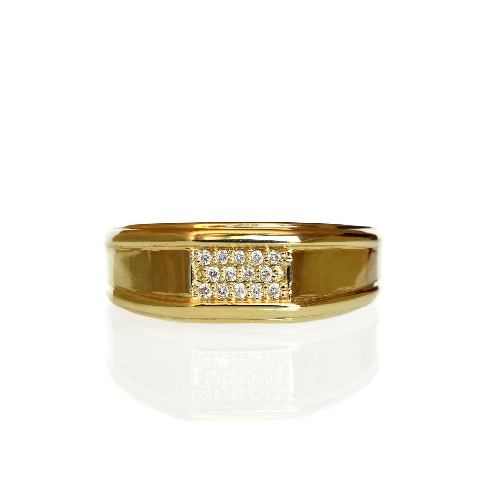 A product photo of a mens' signet ring made of 9k yellow gold on a white background. The face of the ring rectangular, with a frame of 12 natural diamonds that transitions to a thick rounded gold band.