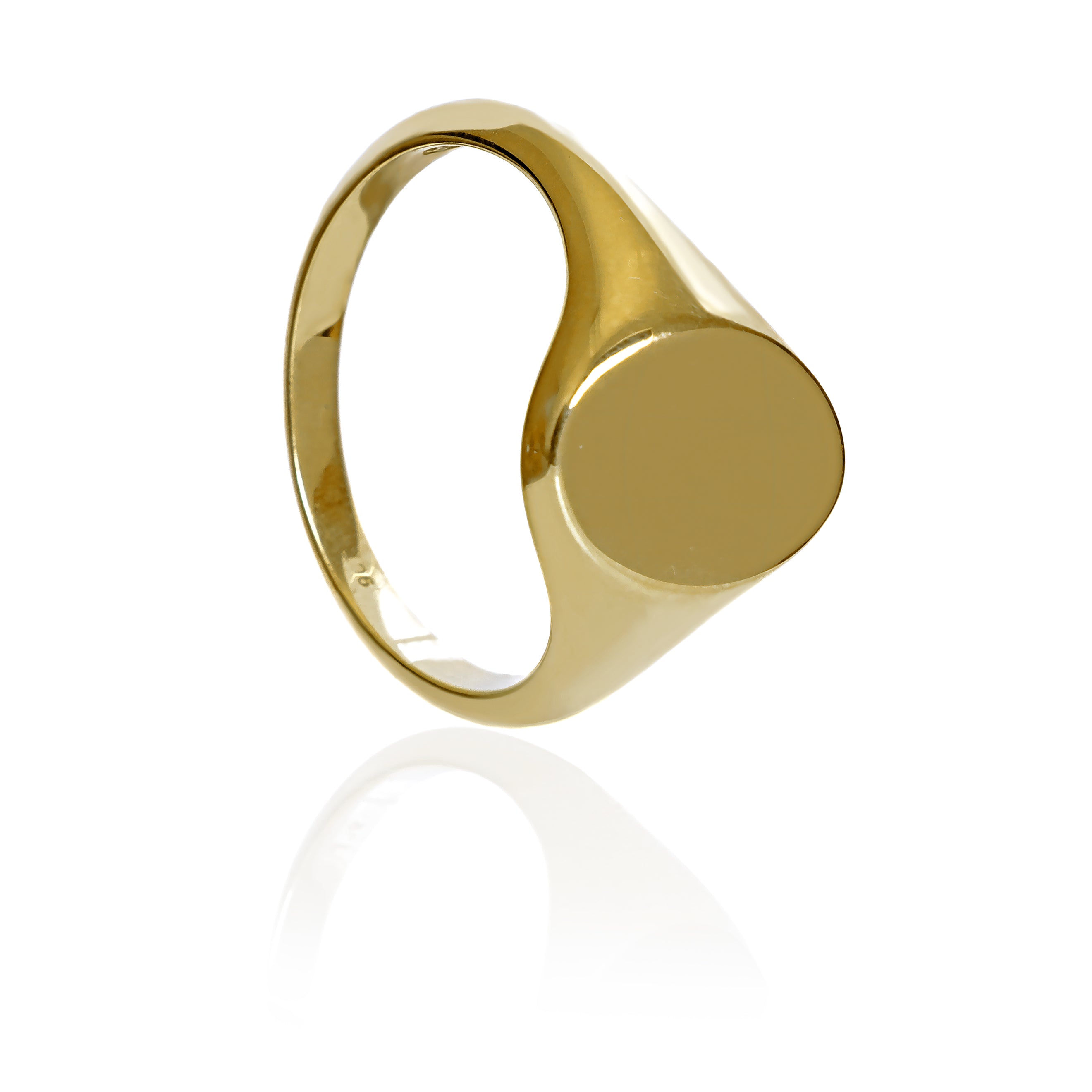 A product photo of a mens' signet ring made of 9k yellow gold on a white background. The face of the ring is an 12x10mm flat ovoid that transitions to a thick rounded band.