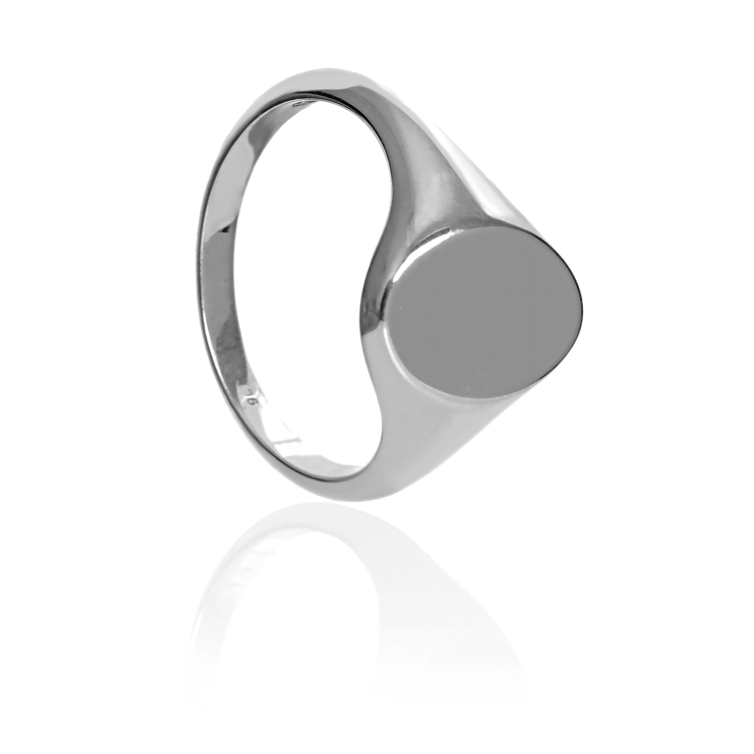A product photo of a mens' signet ring made of 9k white gold on a white background. The face of the ring is an 12x10mm flat ovoid that transitions to a thick rounded band.