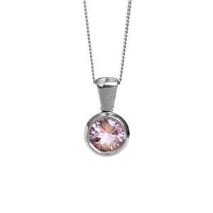 A product photo of a solid 9 karat white gold pink amethyst necklace suspended over a white background. The pendant features