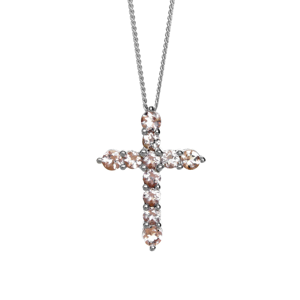 
            
                Load image into Gallery viewer, A product photo of a white gold cross pendant delicately bejewelled with pale pink morganite gemstones suspended by a chain against a white background. The Christian cross pendant is made up of 11 stones in total, with the stones at the end of each prong being slightly bigger than the centre jewels.
            
        