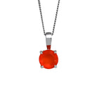 A product photo of a 6mm round carnelian pendant in silver suspended by a silver chain against a white background. The naturally-opaque and cloudy orange stone is almost luminous in the light, and is held in place by 4 delicate silver claws.