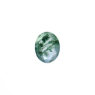 An exquisite 10x8mm Faceted Oval Moss Agate loose gemstone on a plain white background, showcasing intricate deep forest green "moss-like" dendritic inclusions, beautifully suspended within a clear, faceted crystal base. This unique natural green moss agate is ideal for custom engagement rings, bespoke pendants, or as a striking focal point in fine jewellery designs, perfect for nature lovers.