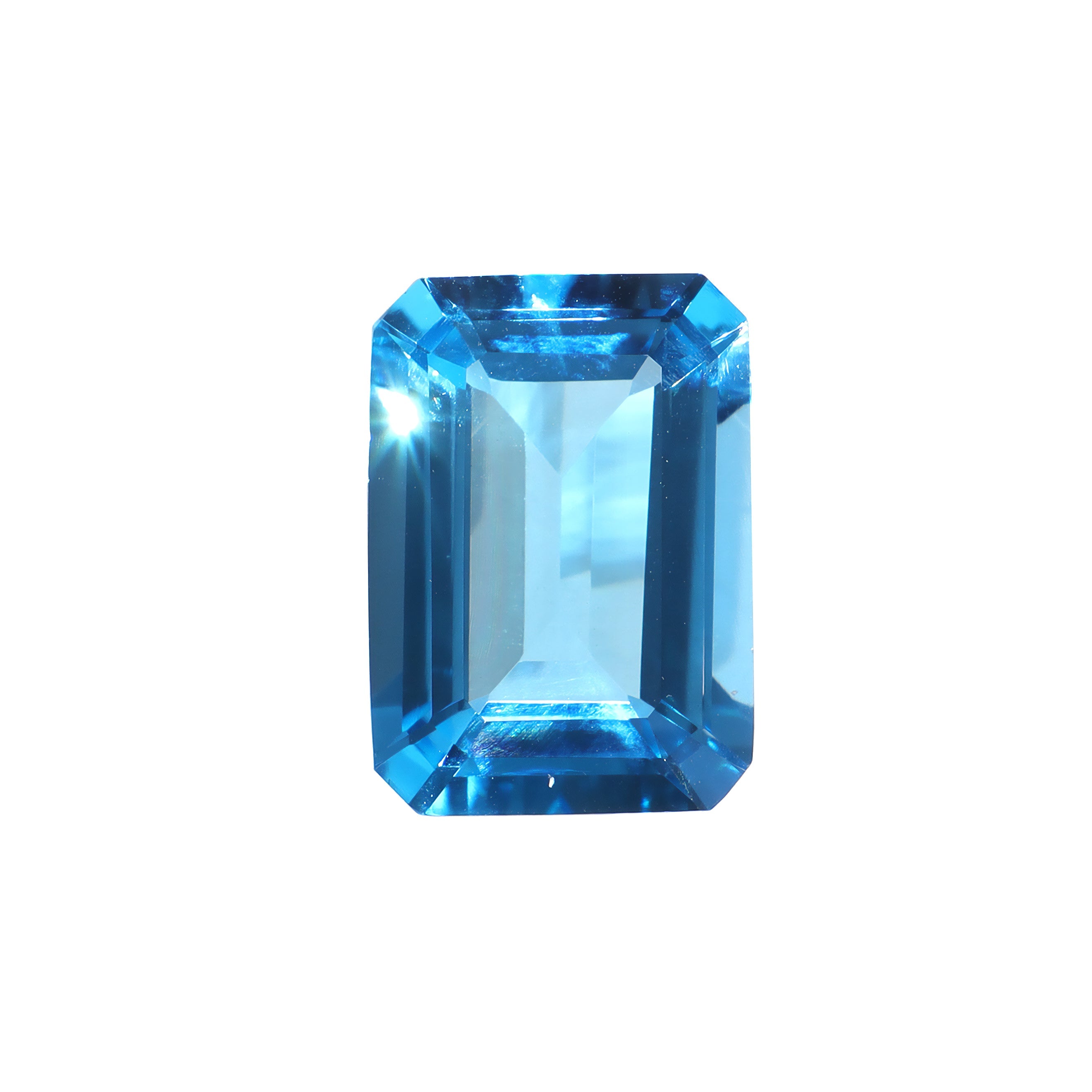 A loose 14x10mm emerald Swiss blue topaz gemstone on a white background. This brilliant, saturated blue topaz, November's birthstone, is perfect for creating custom fine jewellery: including engagement rings, cocktail rings, or a striking birthstone pendant for a loved one born in November. The size is large, but small enough for use in everyday wearable jewellery - and is not limited to statement designs.
