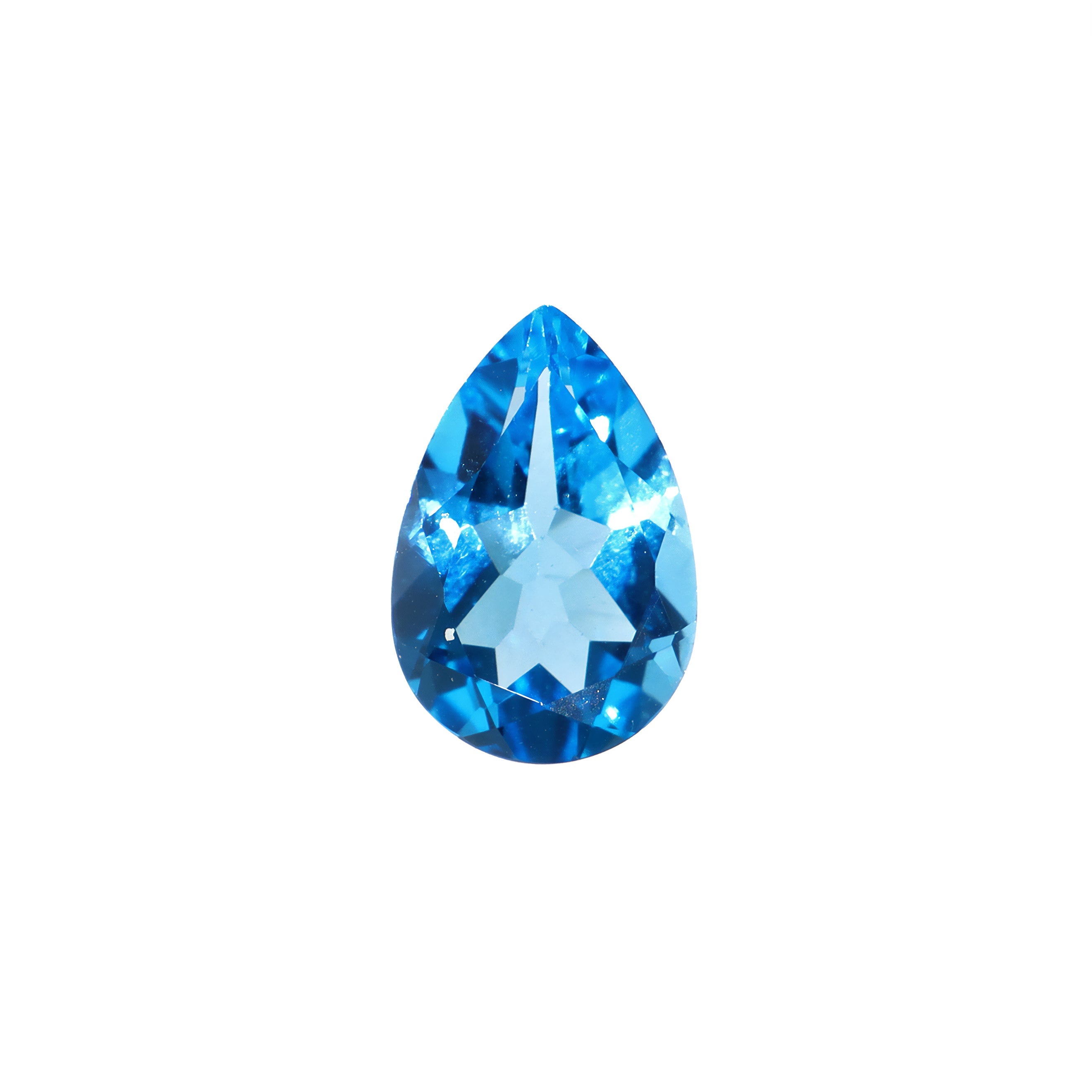 A stunning 12x8mm pear cut Swiss blue topaz gemstone on a white background, featuring a rich, natural vibrant blue hue. This beautifully-faceted topaz pear, also known as the November birthstone, is ideal  for bespoke jewellery design, or as a gift to those with a November birthday.