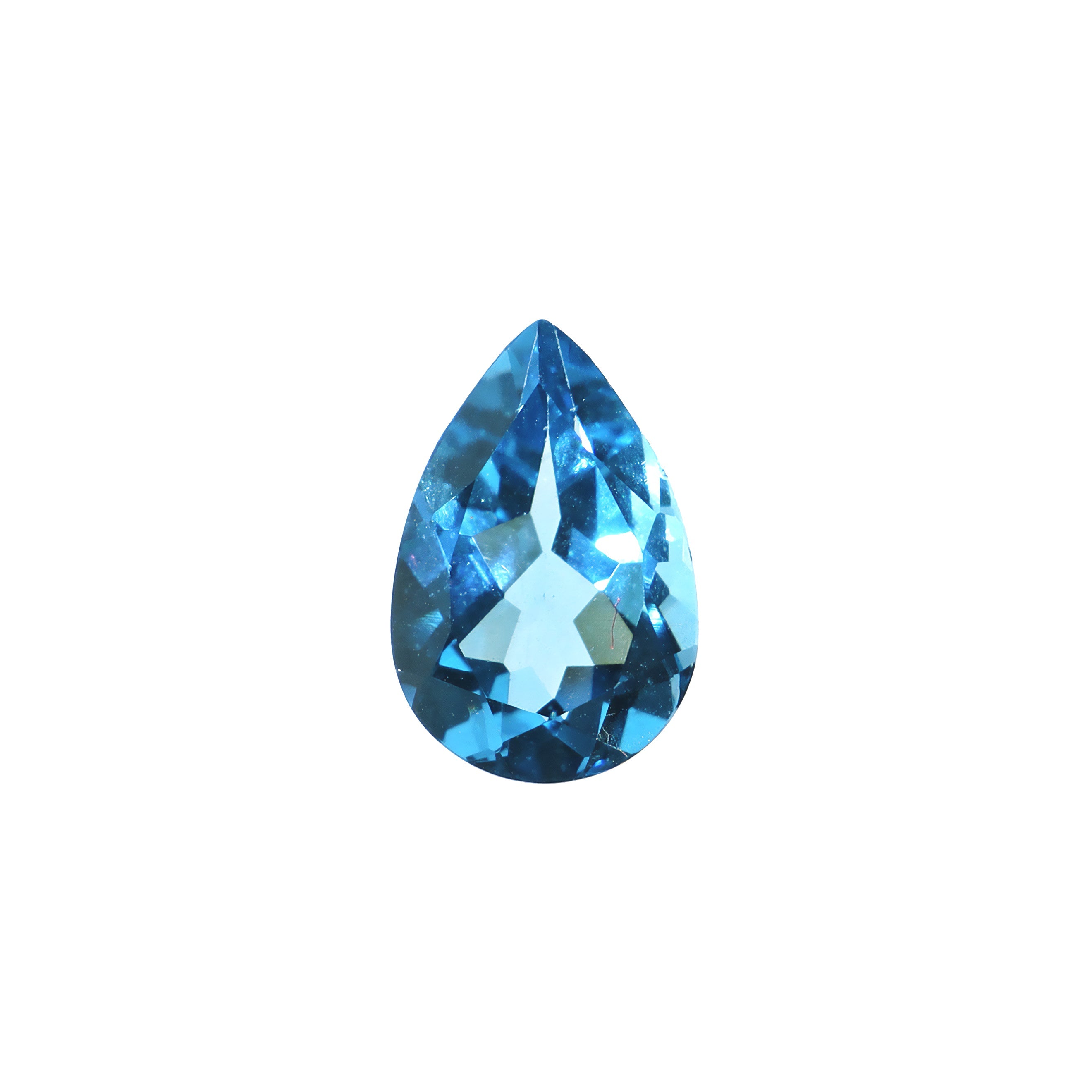 A stunning 12x8mm pear cut Swiss blue topaz gemstone on a white background, featuring a rich, natural vibrant blue hue. This beautifully-faceted topaz pear, also known as the November birthstone, is ideal  for bespoke jewellery design, or as a gift to those with a November birthday.