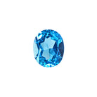 A stunning 11x9mm Oval cut Swiss blue topaz gemstone on a white background, featuring a rich, natural saturated blue hue. This beautifully-faceted blue topaz oval, also known as the November birthstone, is ideal  for bespoke jewellery design, or as a gift to those with a November birthday.