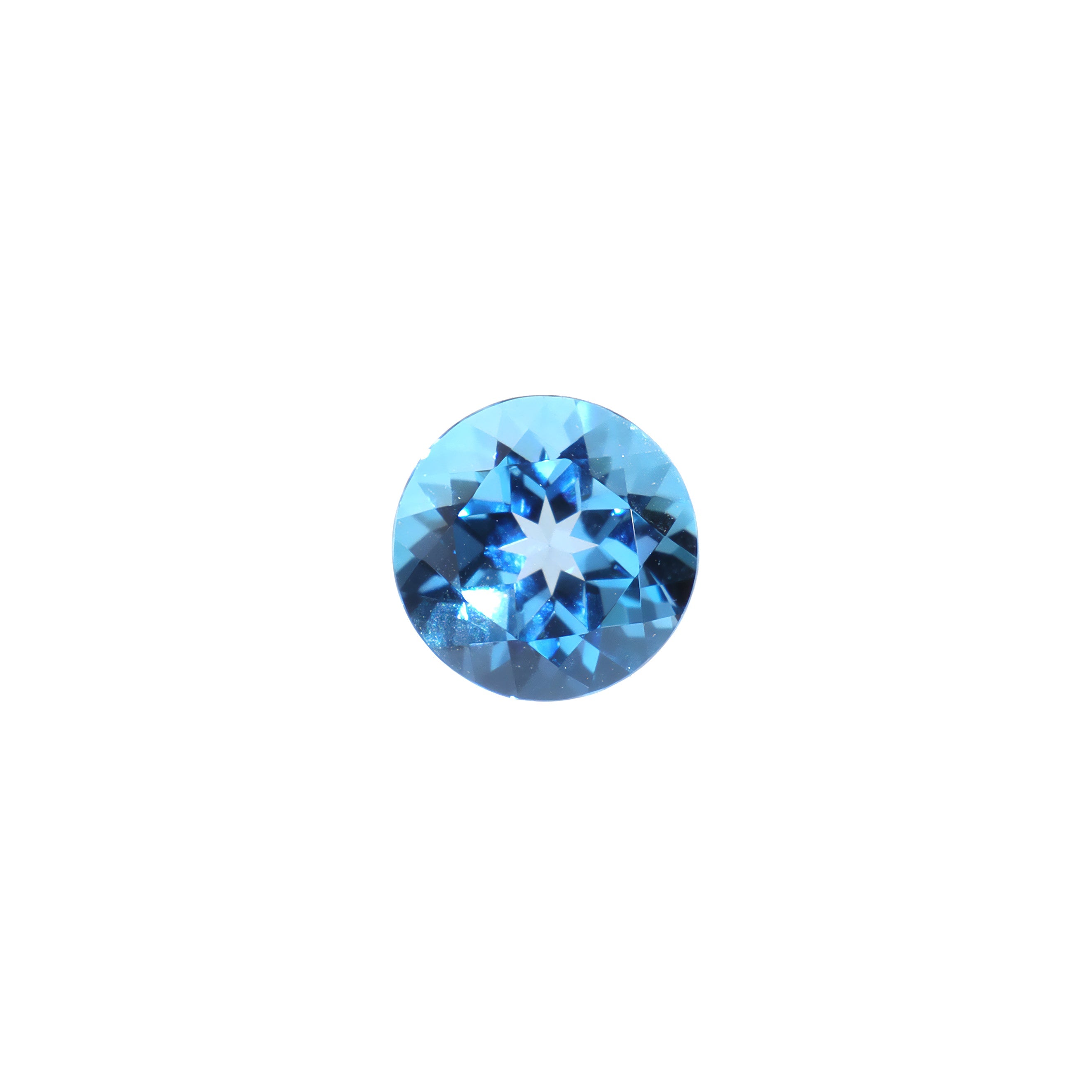 A loose 8mm round Swiss blue topaz gemstone on a white background. This large, brilliantly cut natural topaz displays a vibrant blue hue, perfect for use in bespoke luxury jewellery designs. An excellent choice for a November birthstone pendant, or as an addition to one's personal gemstone collection.