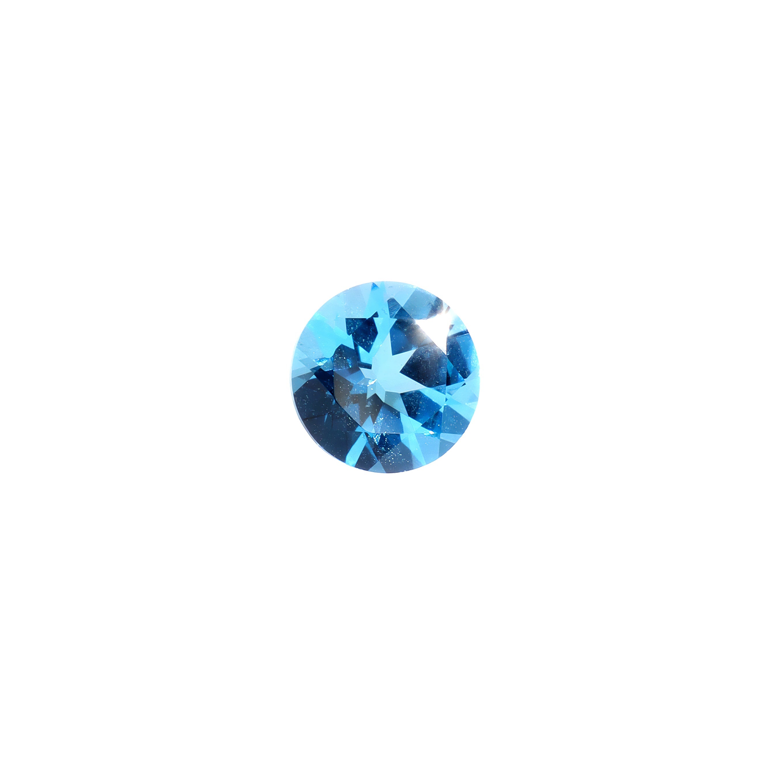 A loose 7mm round Swiss blue topaz gemstone on a white background. This large, brilliantly cut natural topaz displays a vibrant blue hue, perfect for use in bespoke luxury jewellery designs. An excellent choice for a November birthstone pendant, or as an addition to one's personal gemstone collection.