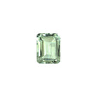 An elegant 9x7mm laser-cut octagonal green amethyst gemstone on a white background. The stone is intricately cut with modern laser tech, giving it a striking, geometric pattern and exceptional internal brilliance. The facets create multiple, sharp light reflections, making the stone appear highly sparkly and dynamic, showcasing its unusual mint green colouring. Perfect for a February birthday gift.