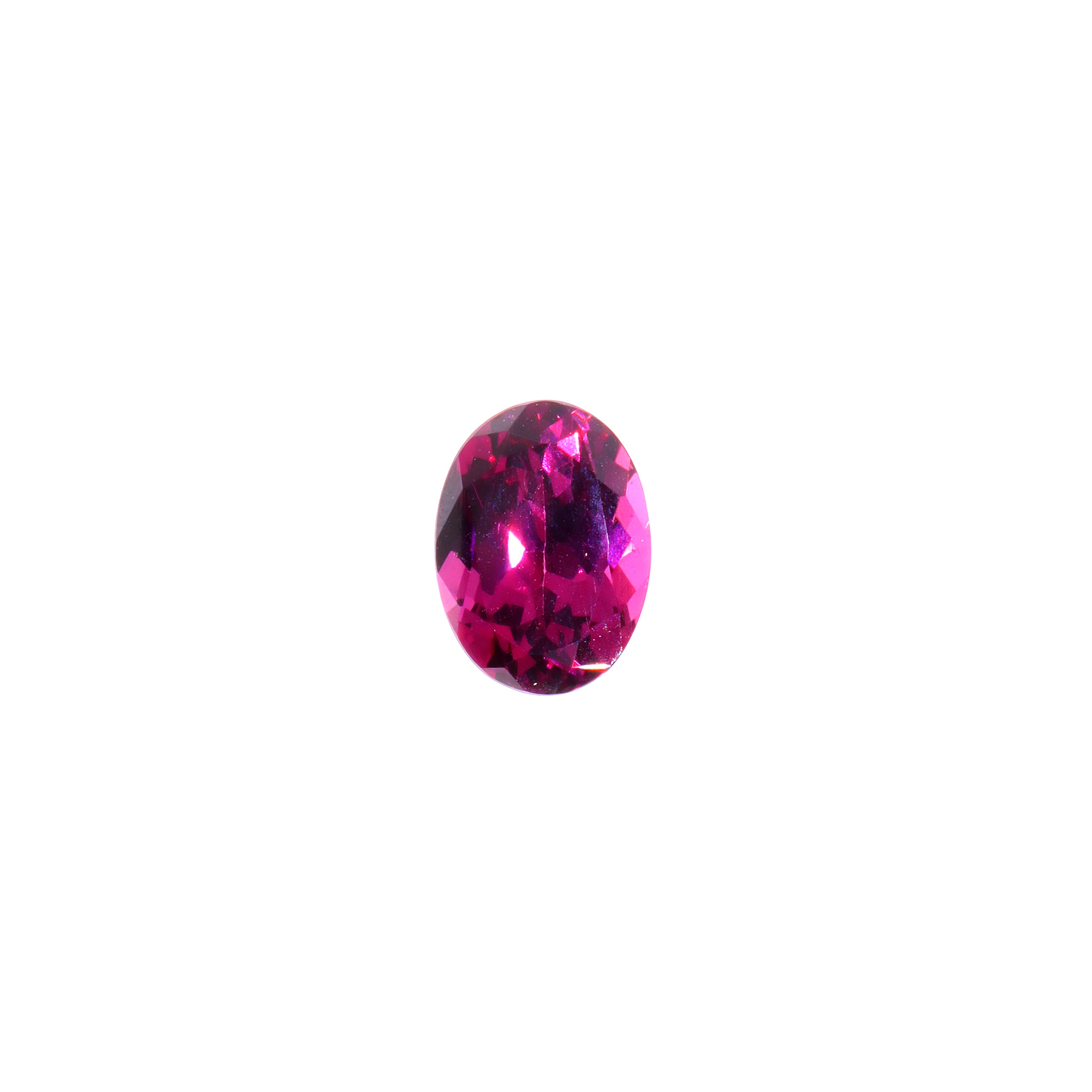 A loose 8x6mm oval cut grape garnet gemstone on a white background. This brilliant, richly coloured grape garnet, a variant of January's birthstone, is perfect for creating custom fine jewellery: including engagement rings, cocktail rings, or a striking birthstone pendant for a loved one born in January. The size is large, but small enough for use in everyday wearable jewellery - and is not limited to statement designs.