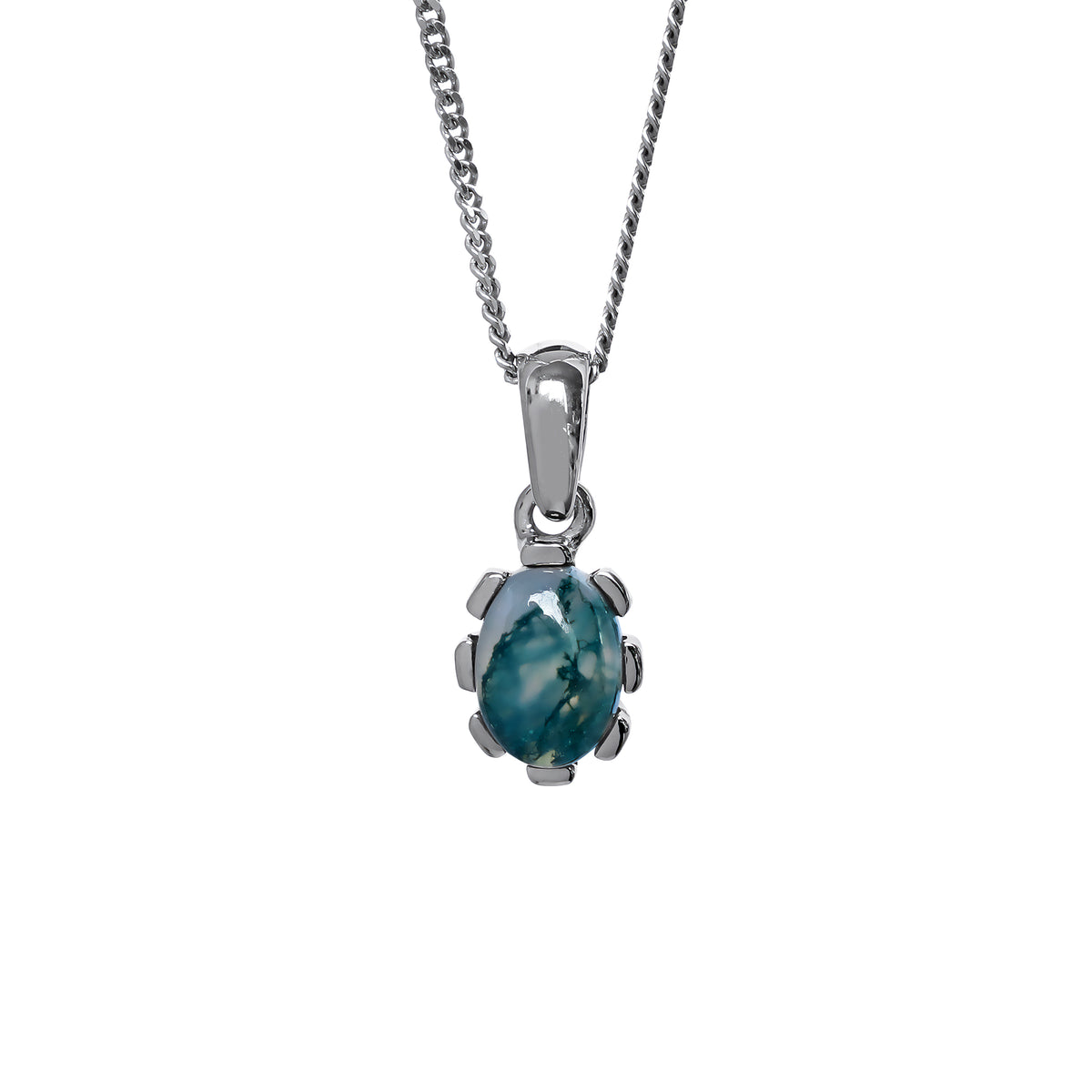 A product photo of a cabochon moss agate set in solid sterling silver suspended by a silver chain over a white background. The smooth cabochon moss agate displays cloudy green inclusions, and is framed by flowery sterling silver detailing.