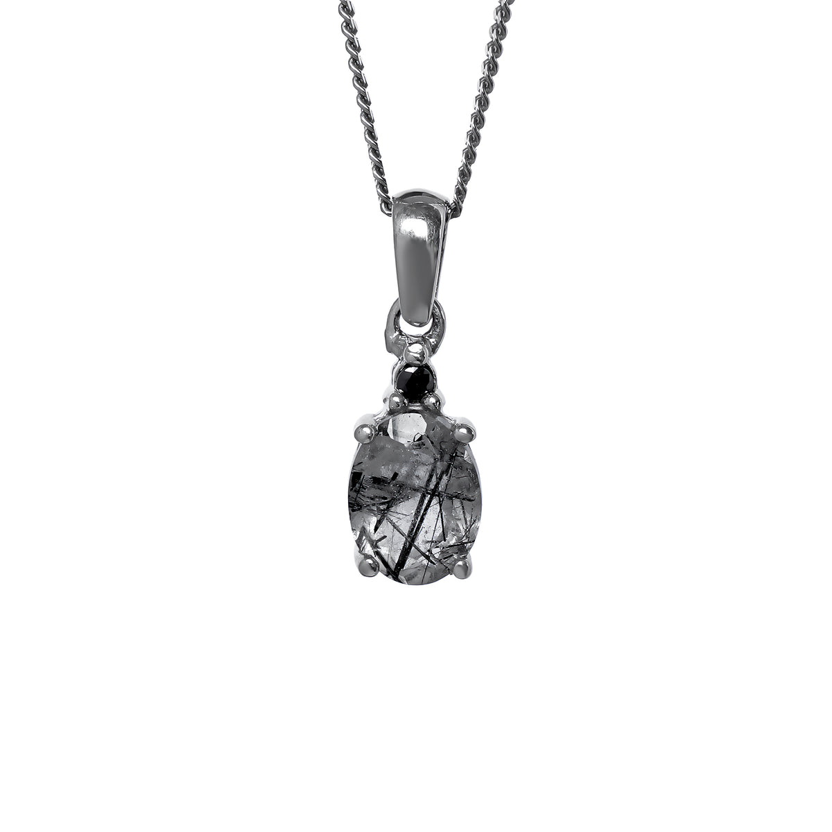A product photo of a silver tourmalated quartz and moissanite necklace suspended against a white background. The beautifully unique tourmalated quartz stone is held in place by 4 pairs of claws at its top and bottom, with a singular white moissanite connecting the stone to the rest of the pendant. It is suspended by a simple silver chain.