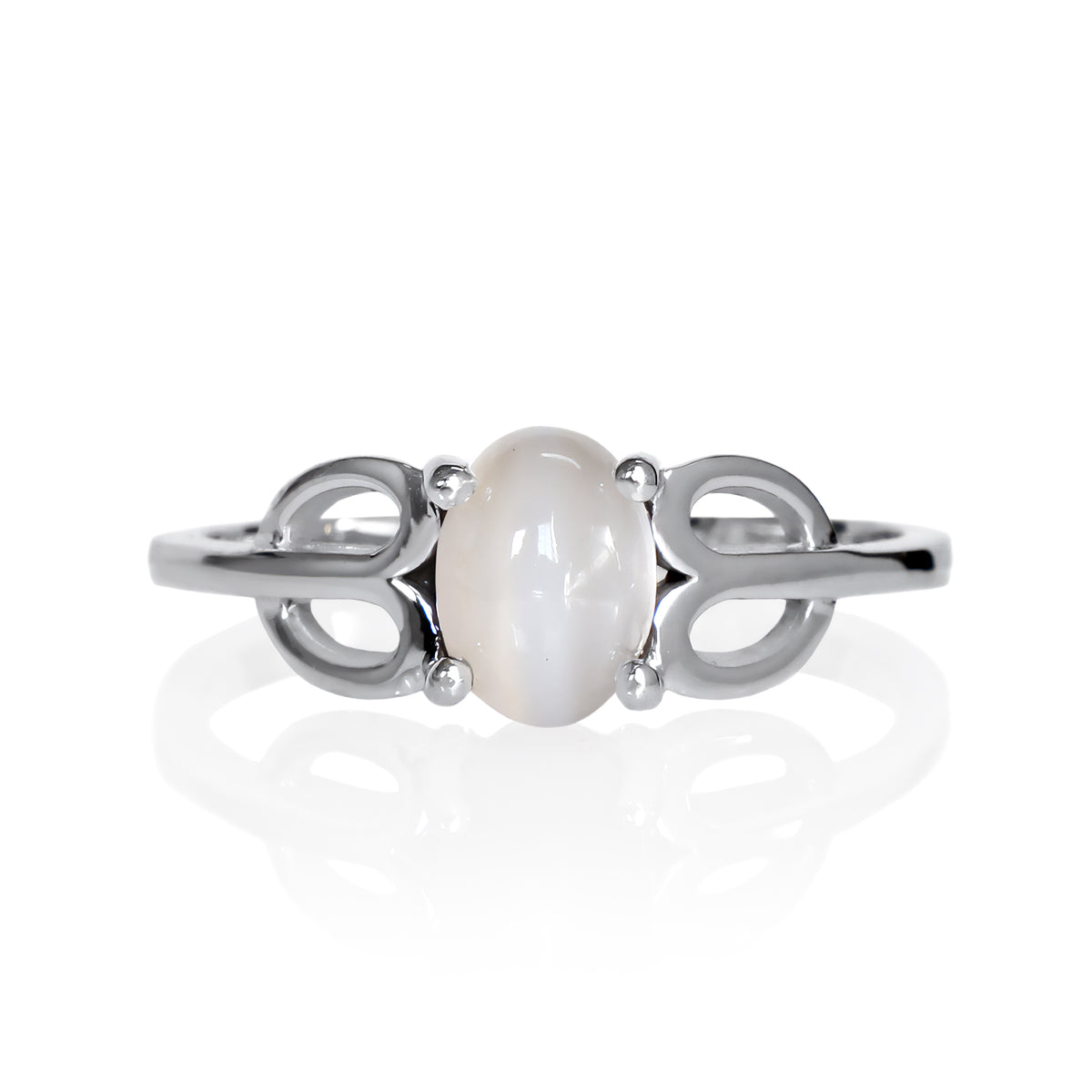 A product photo of a silver moonstone ring on a white background. The ring consists of a single 7x5mm cabochon-cut moonstone stone hugged between two looping silver "petals" on either side, which transition into a smooth flat band in the middle.