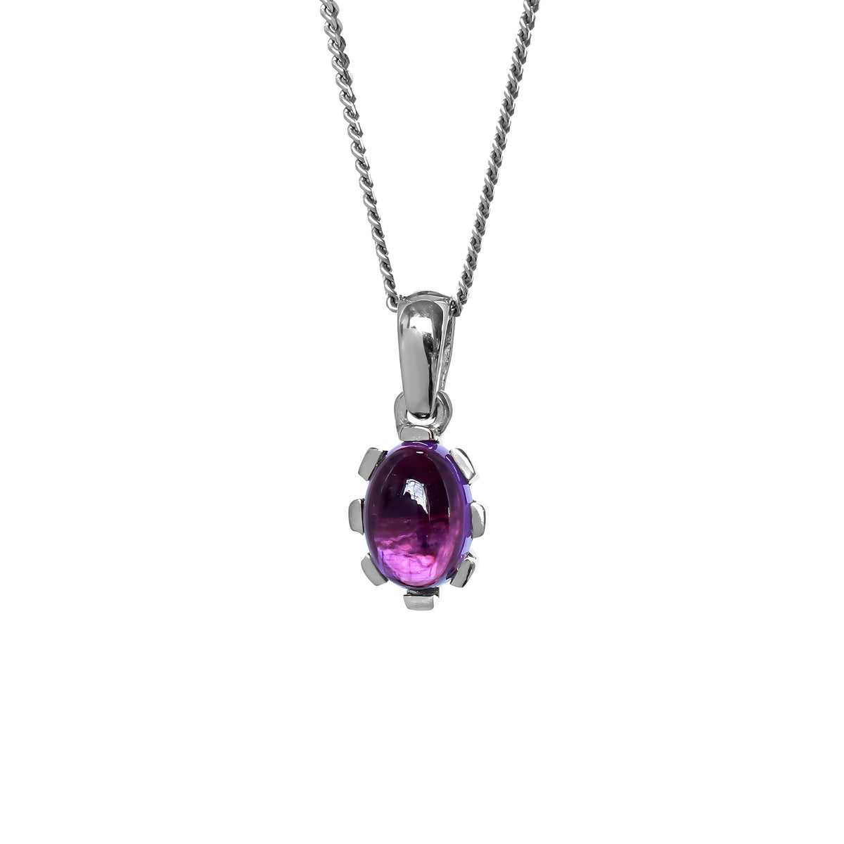 A product photo of a cabochon purple amethyst set in solid sterling silver suspended by a silver chain over a white background. The smooth cabochon amethyst is framed by flowery sterling silver detailing.