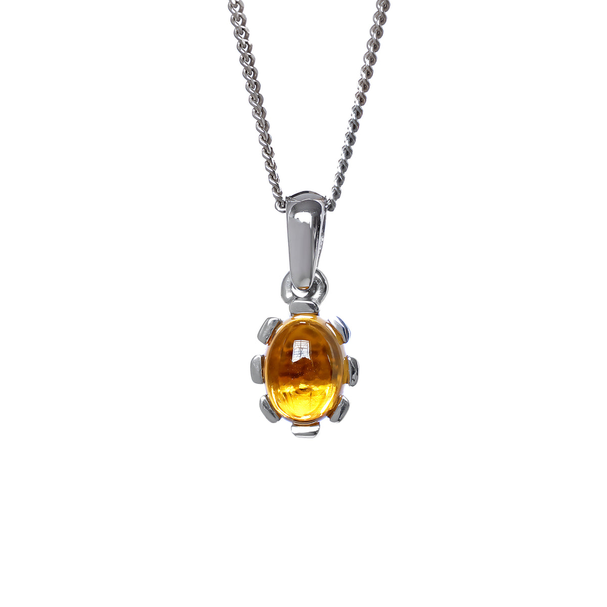 A product photo of a cabochon purple citrine set in solid sterling silver suspended by a silver chain over a white background. The smooth cabochon citrine is framed by flowery sterling silver detailing.