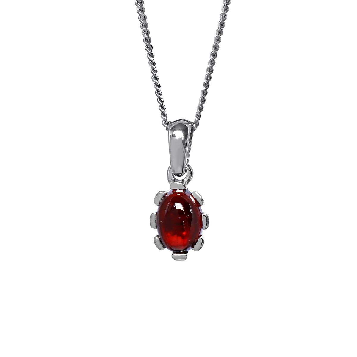 A product photo of a cabochon purple garnet set in solid sterling silver suspended by a silver chain over a white background. The smooth cabochon garnet is framed by flowery sterling silver detailing.