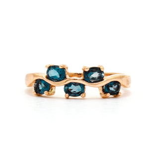
            
                Load image into Gallery viewer, An elaborate rose gold ring decorated with topaz.
            
        