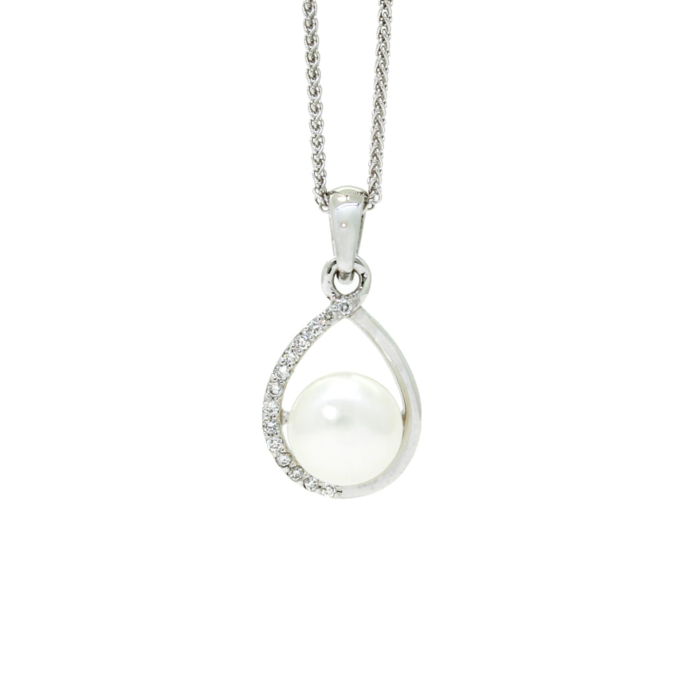 A product photo of a white gold pendant in a teardrop-shaped frame, with a white pearl settled at the bottom and diamond detailing along the one side. It is suspended by a white gold chain against a white background.