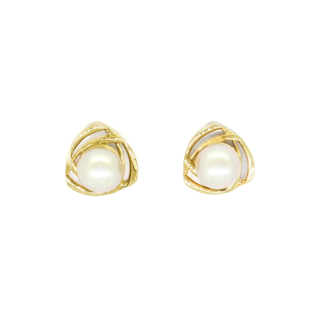 A product photo of ornate white pearl earring studs with detailed yellow gold backs on a white background.